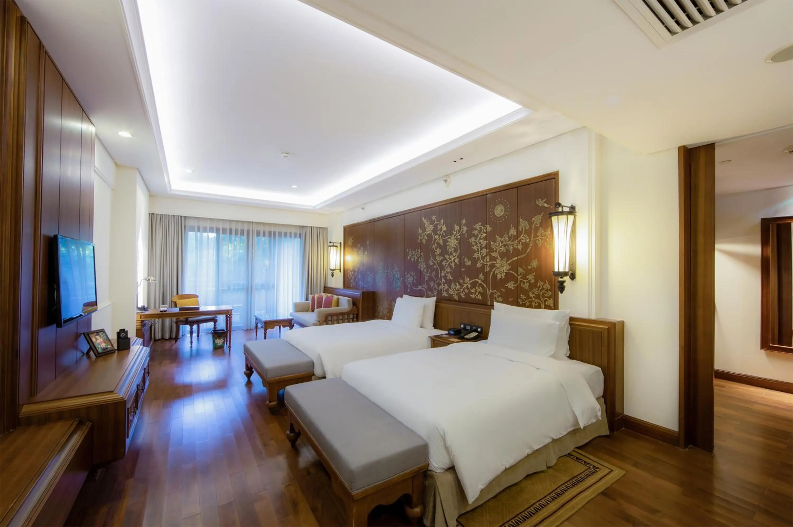 Bed in InterContinental Xishuangbanna Resort by IHG
