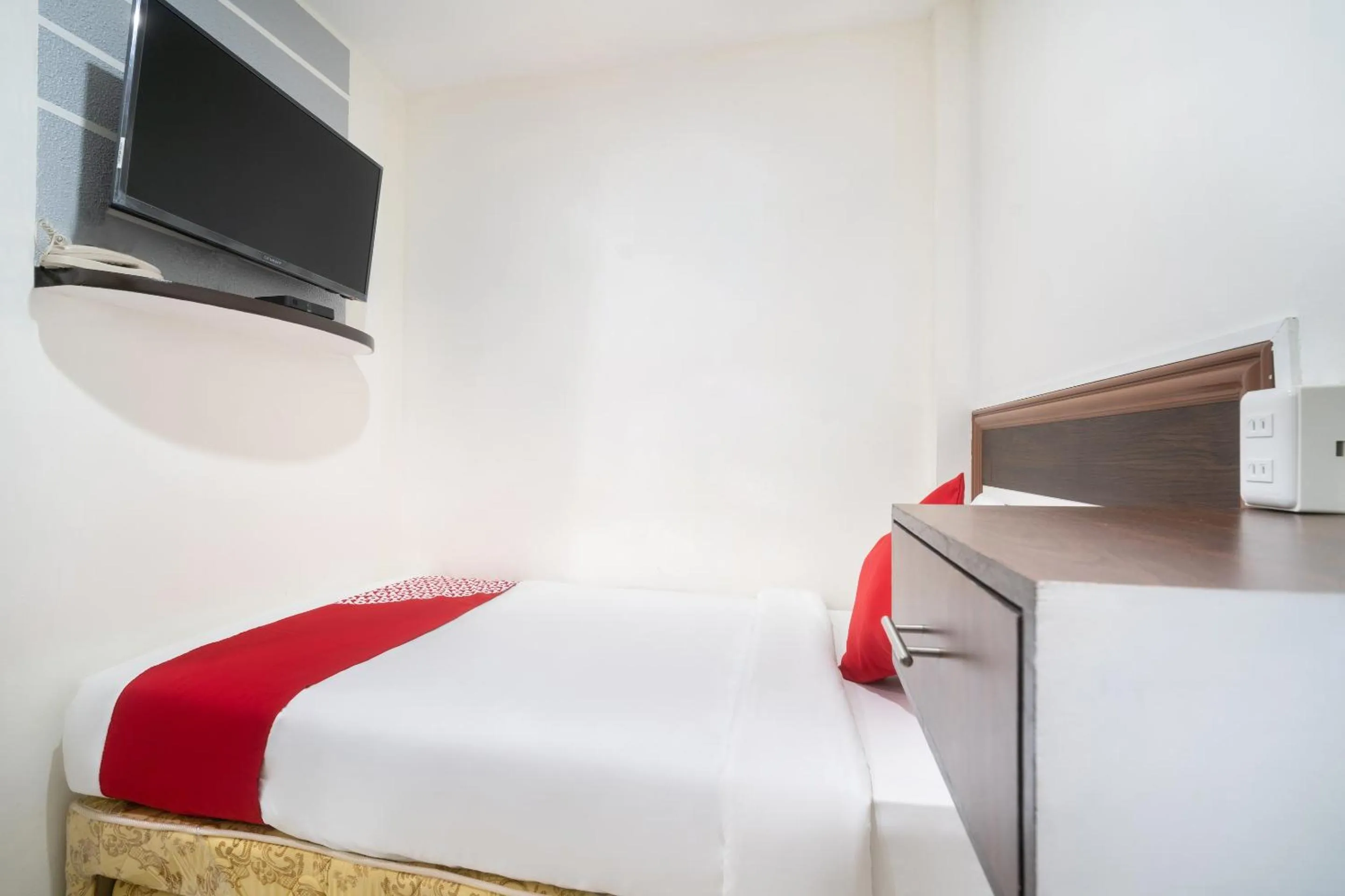 Bedroom in Circle-b Apartelle & Suites