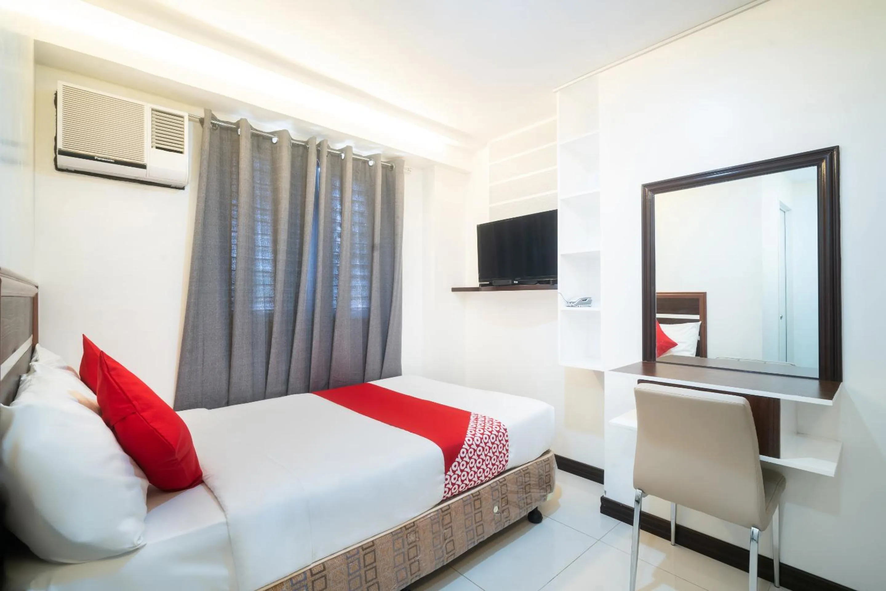 Bedroom in Circle-b Apartelle & Suites