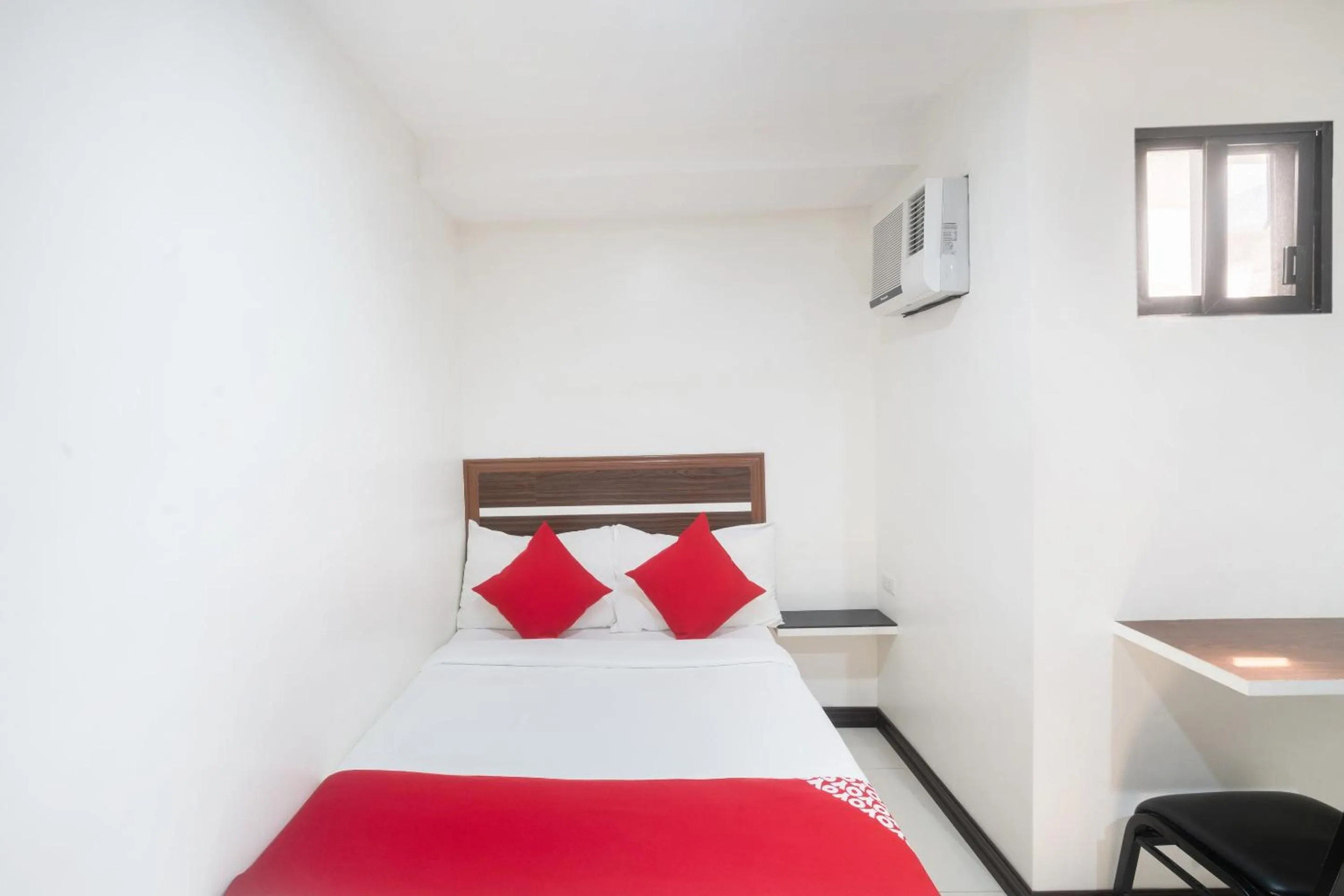 Bedroom in Circle-b Apartelle & Suites