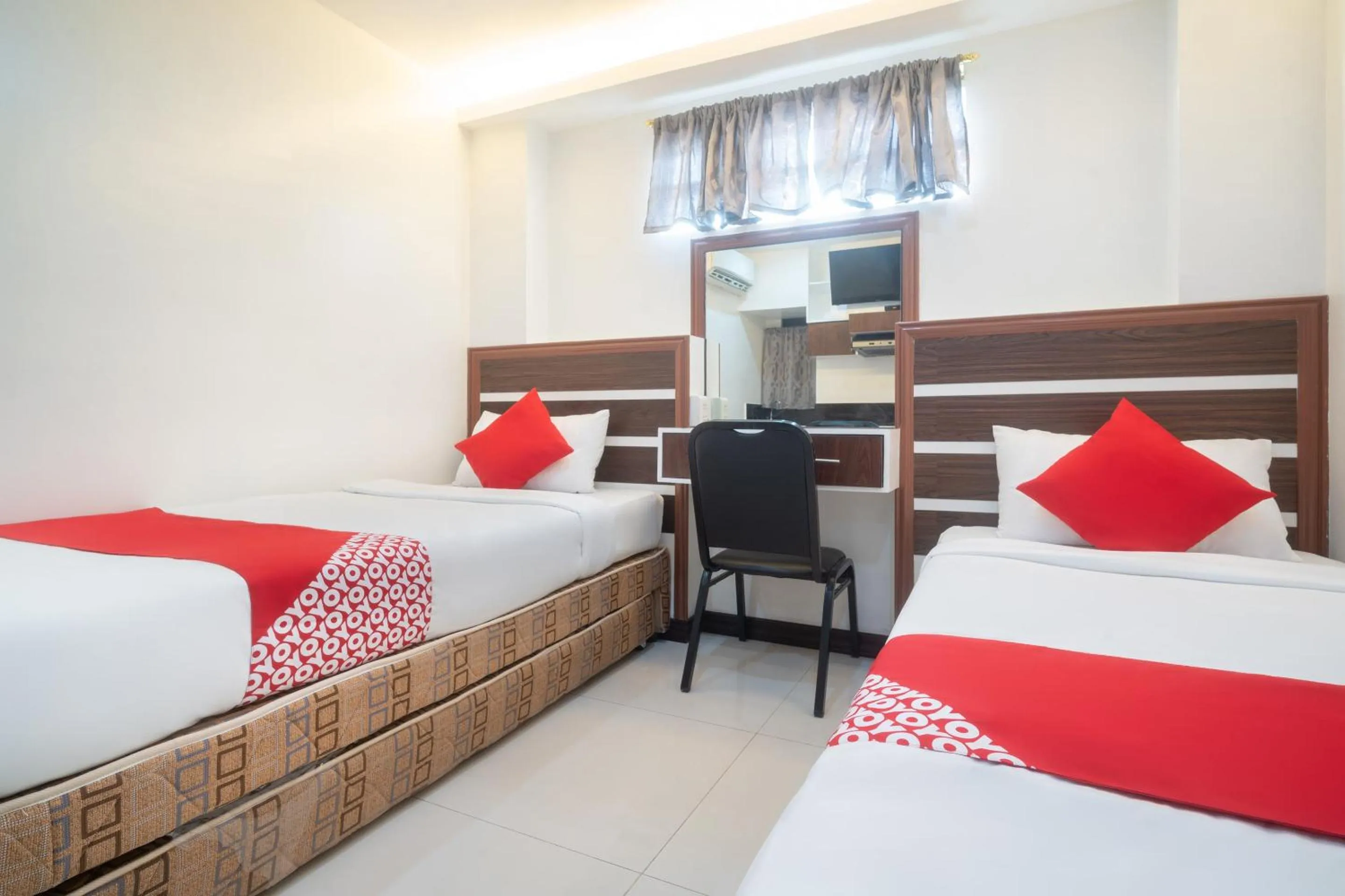 Bedroom in Circle-b Apartelle & Suites