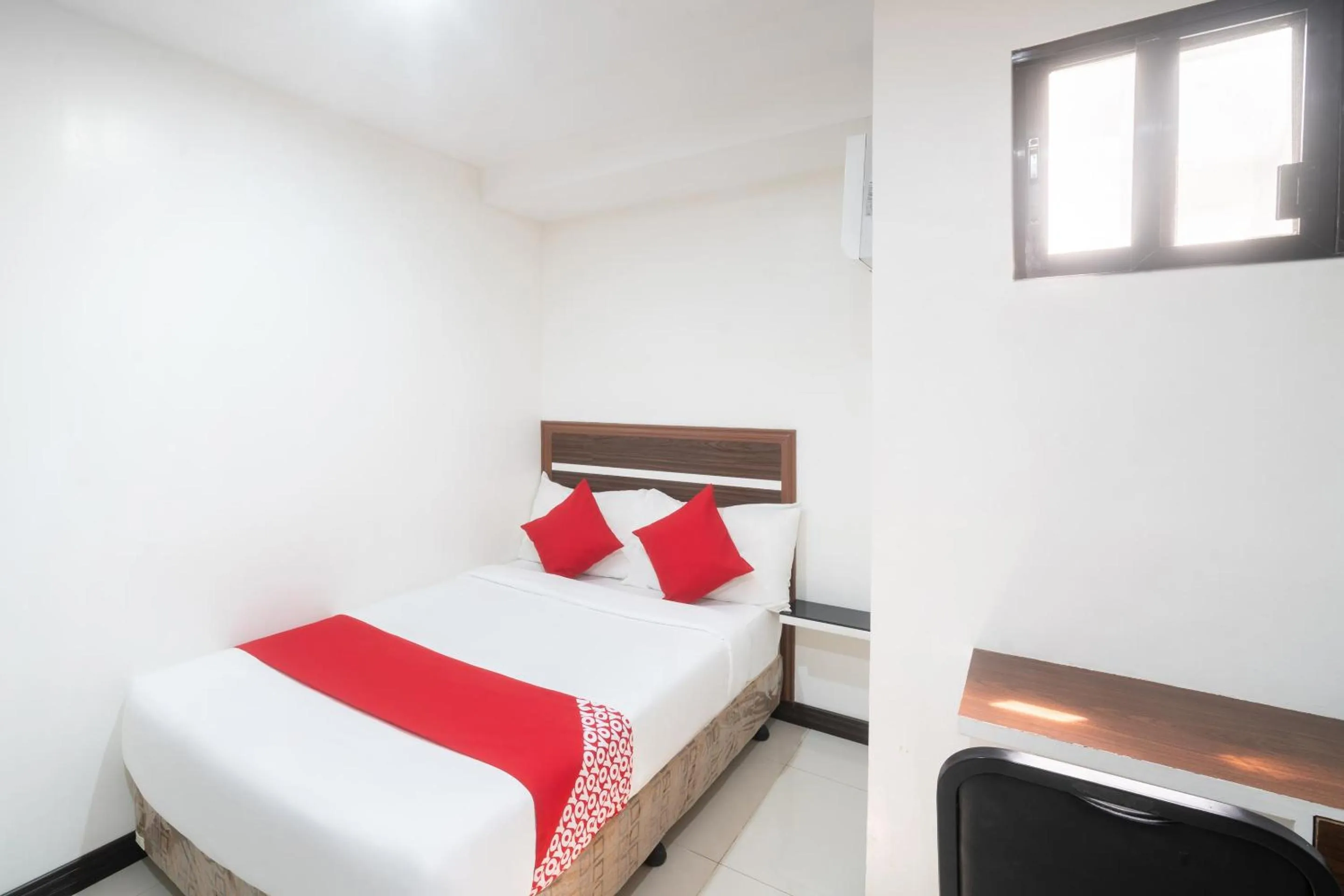 Bedroom in Circle-b Apartelle & Suites