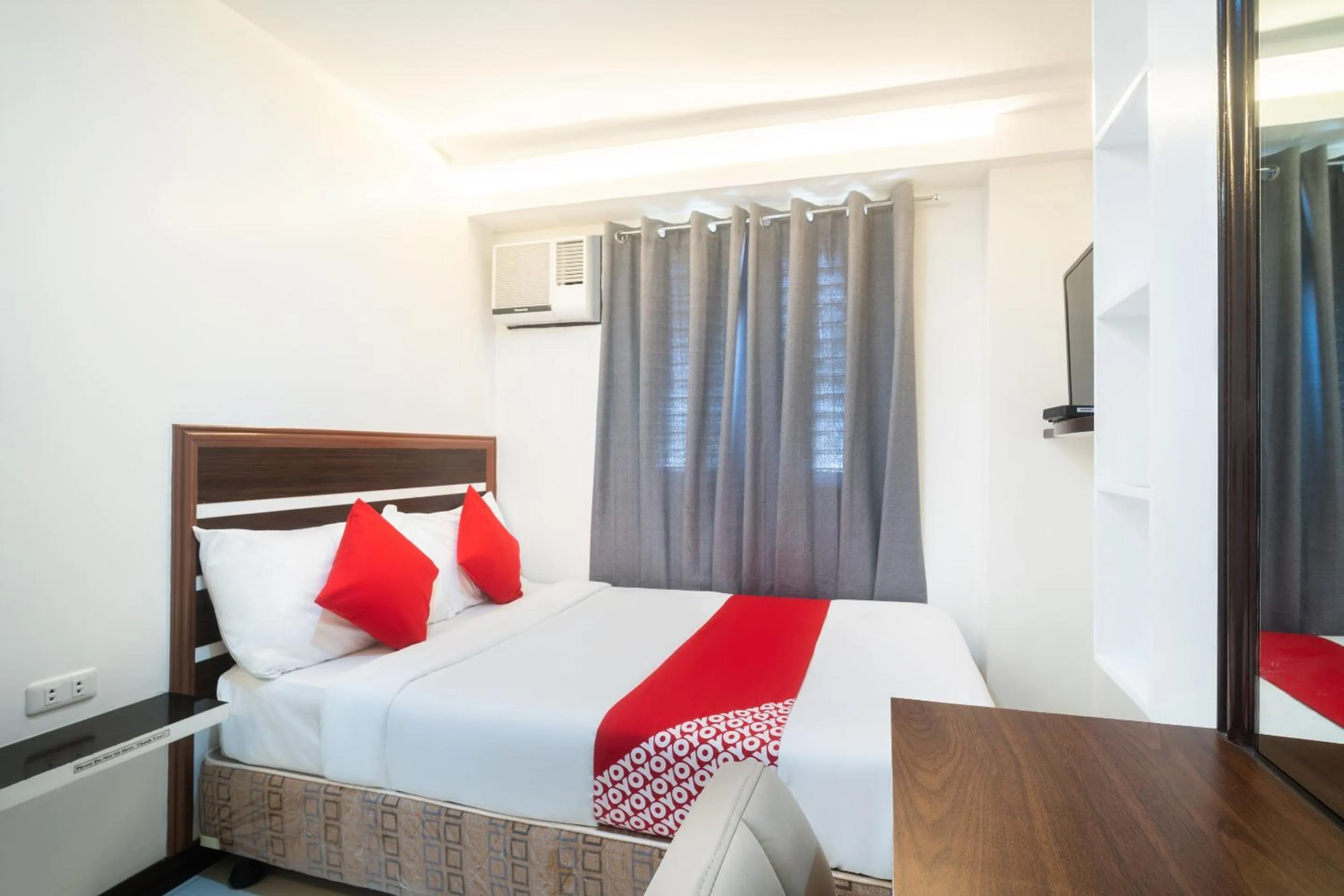 Bedroom in Circle-b Apartelle & Suites