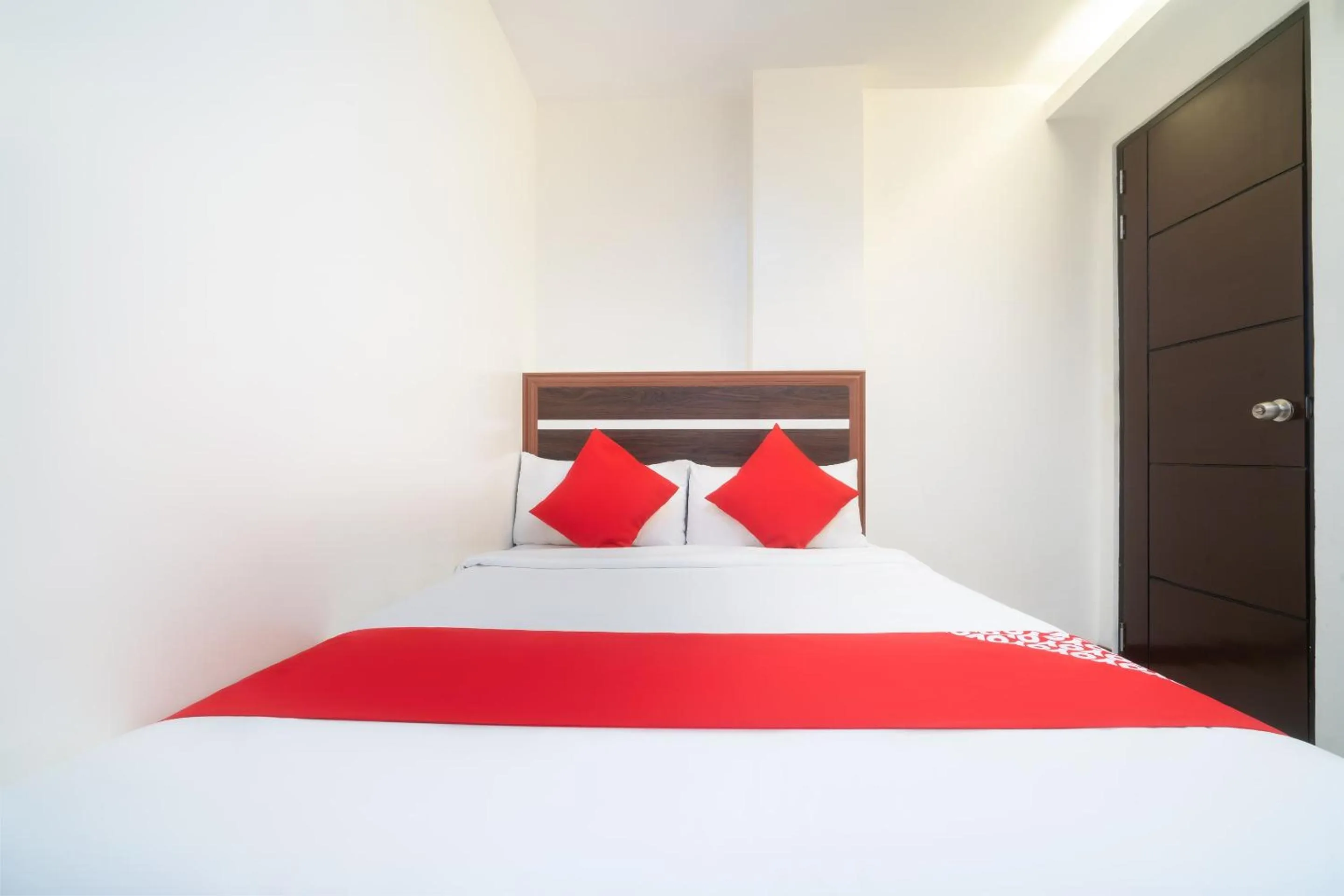 Bedroom in Circle-b Apartelle & Suites