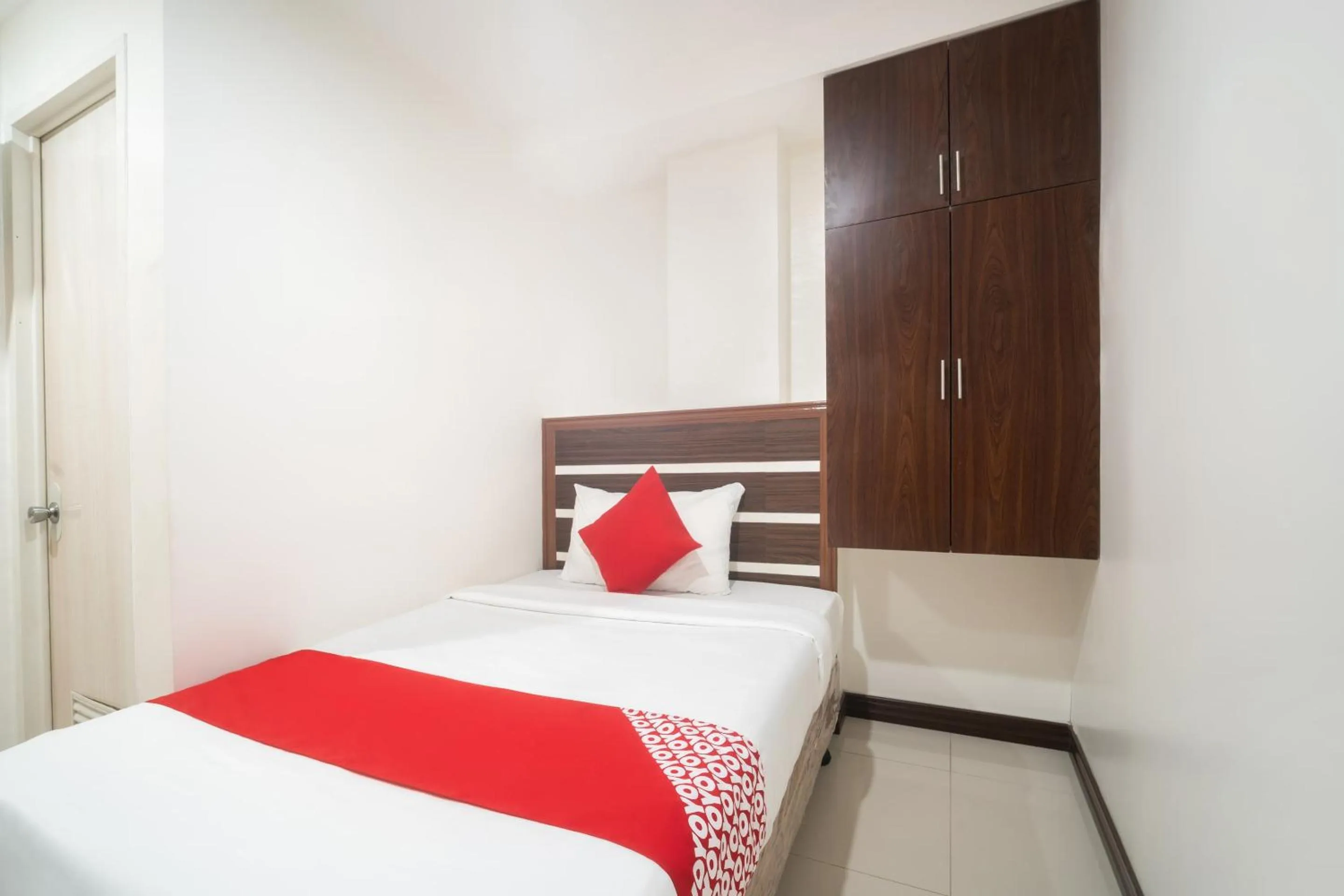 Bedroom in Circle-b Apartelle & Suites