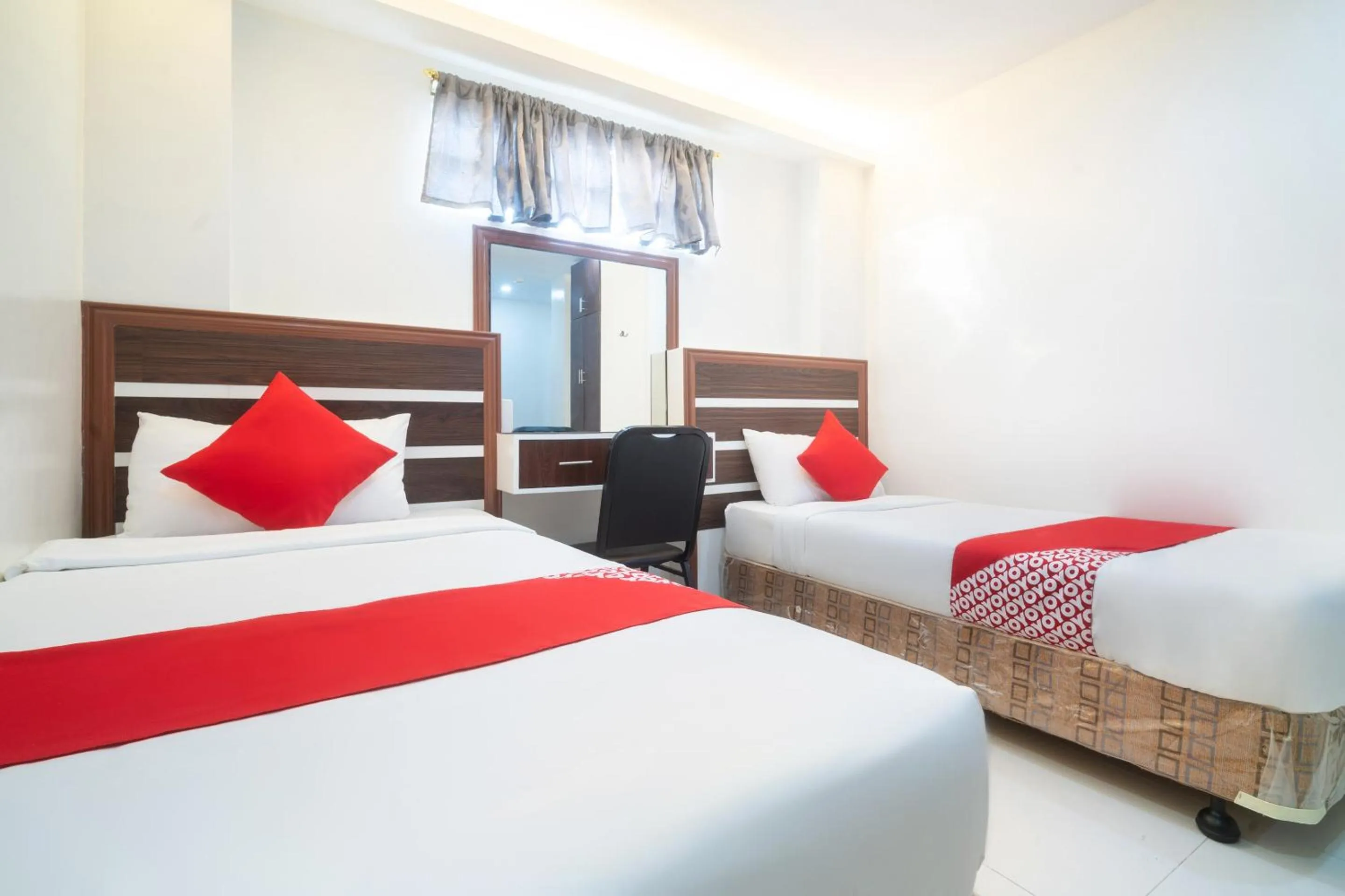 Bedroom in Circle-b Apartelle & Suites