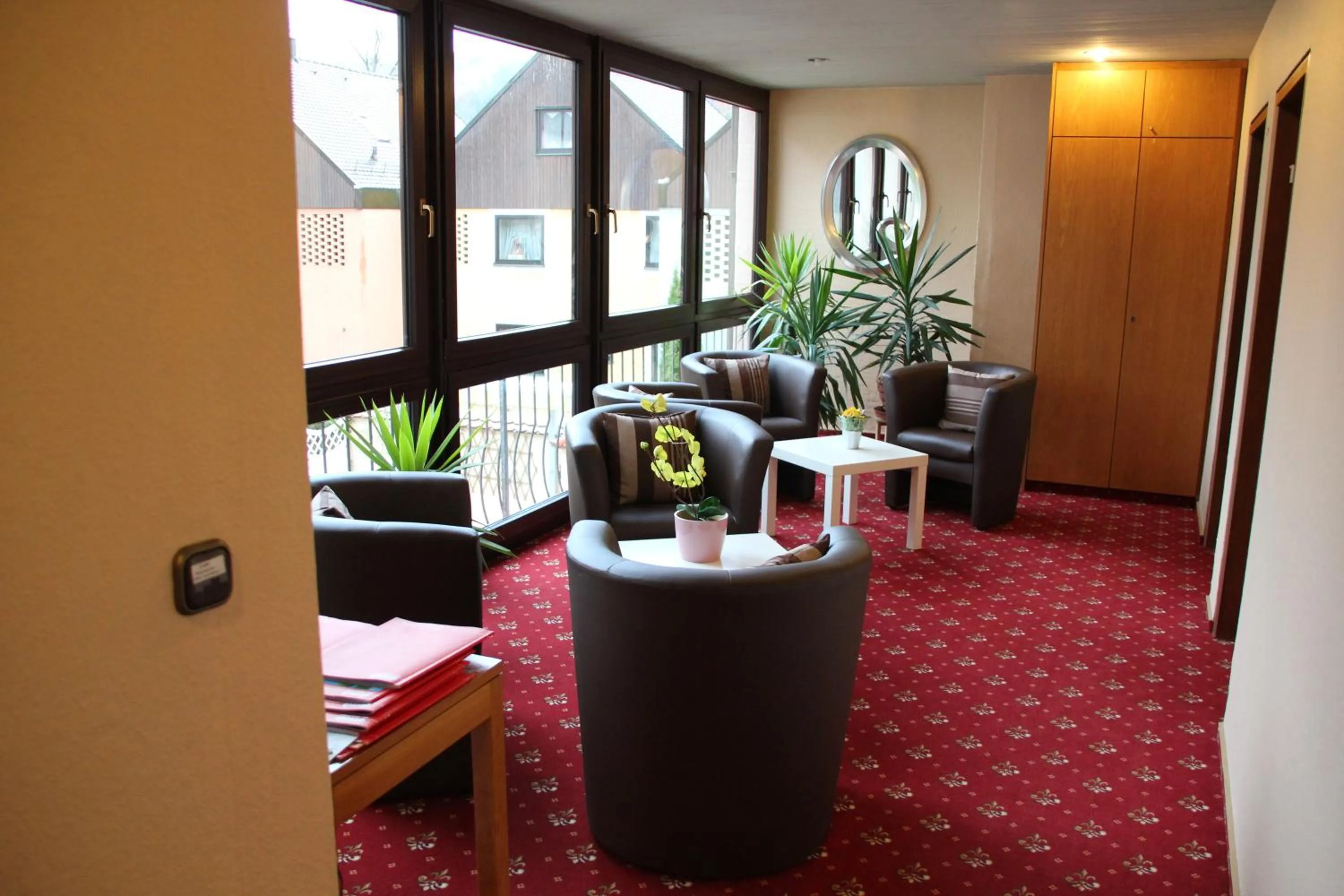 Communal lounge/ TV room in Hotel garni Fuchs