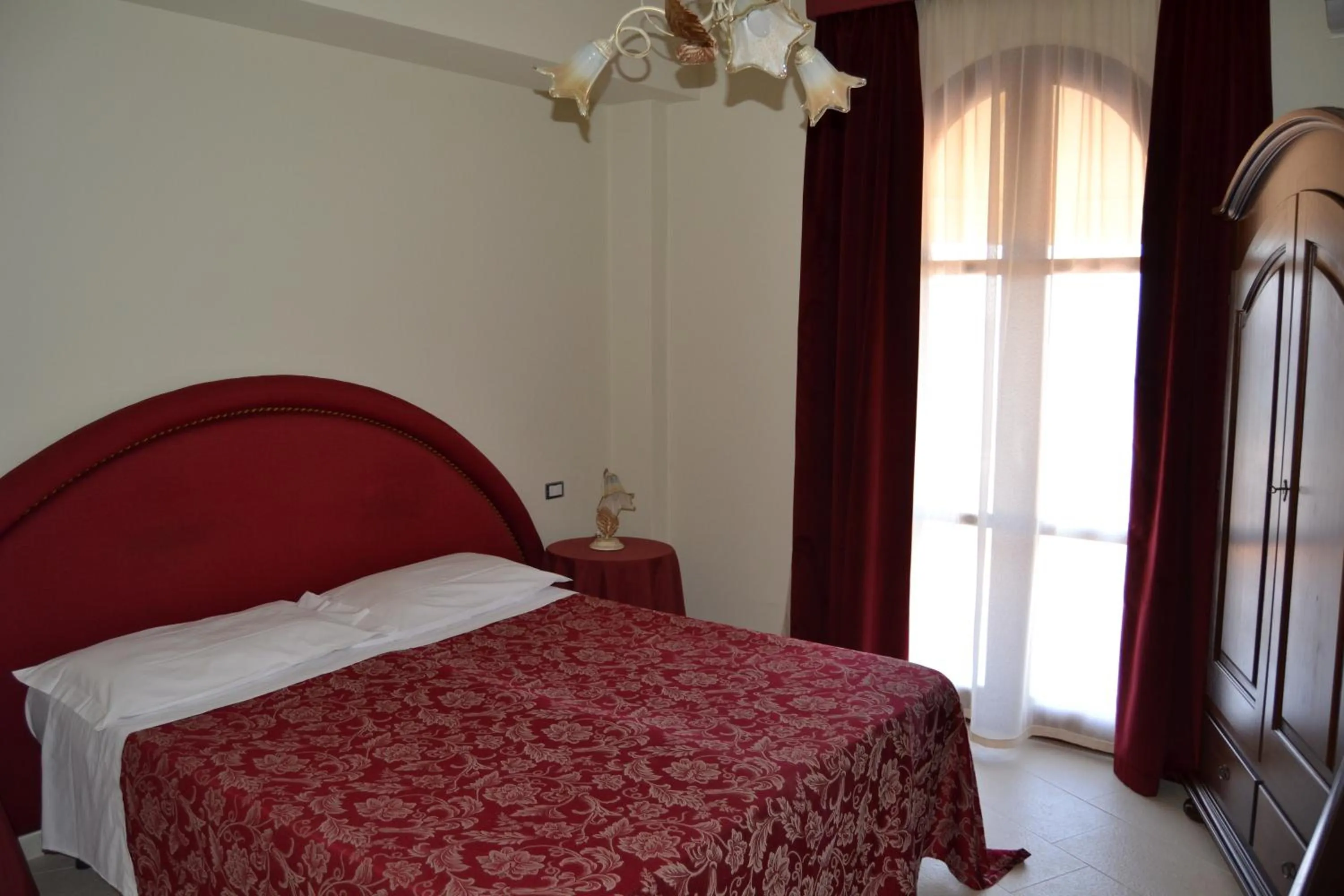 Bed in Hotel Porto Azzurro