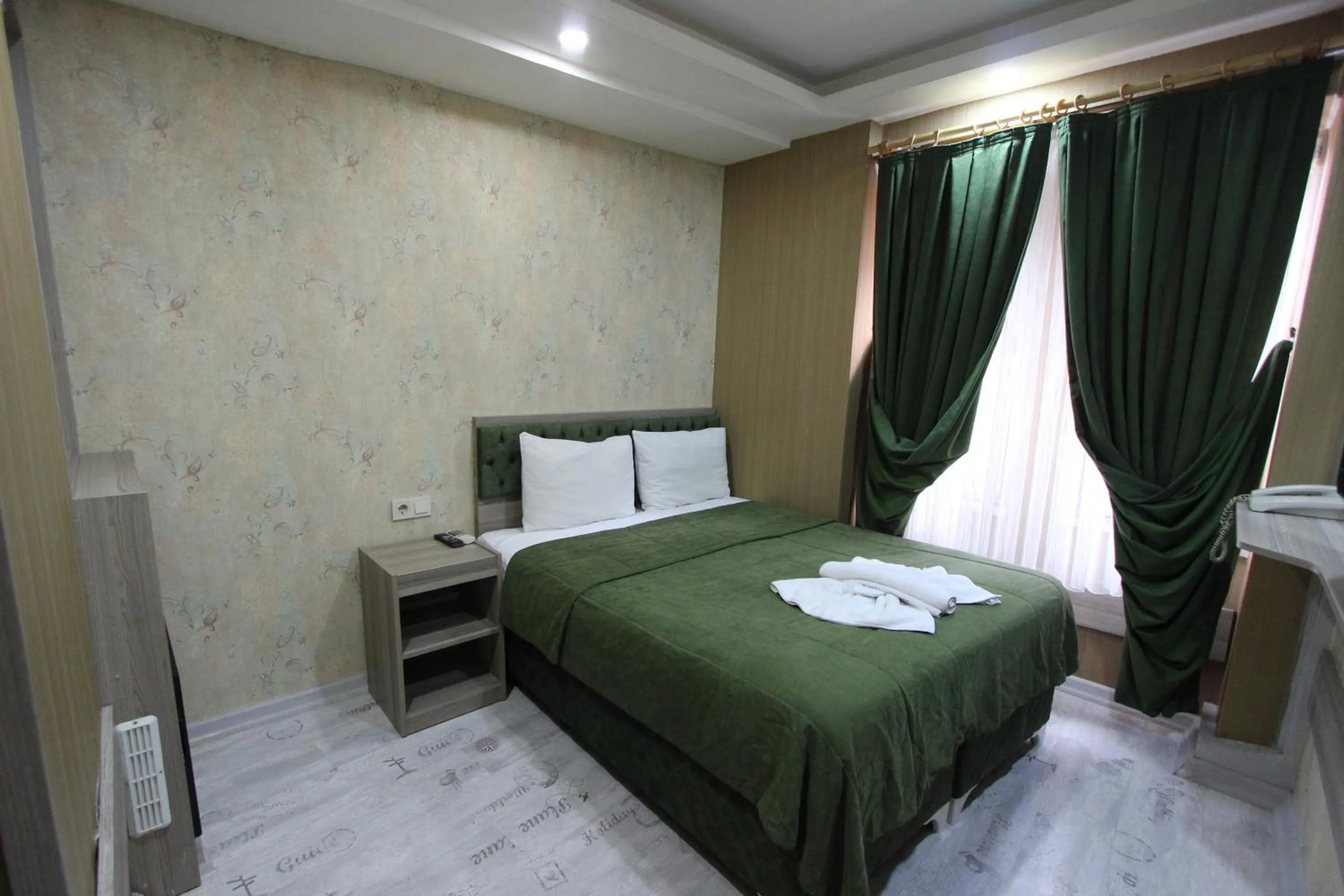 Bed in Kaya Madrid Hotel