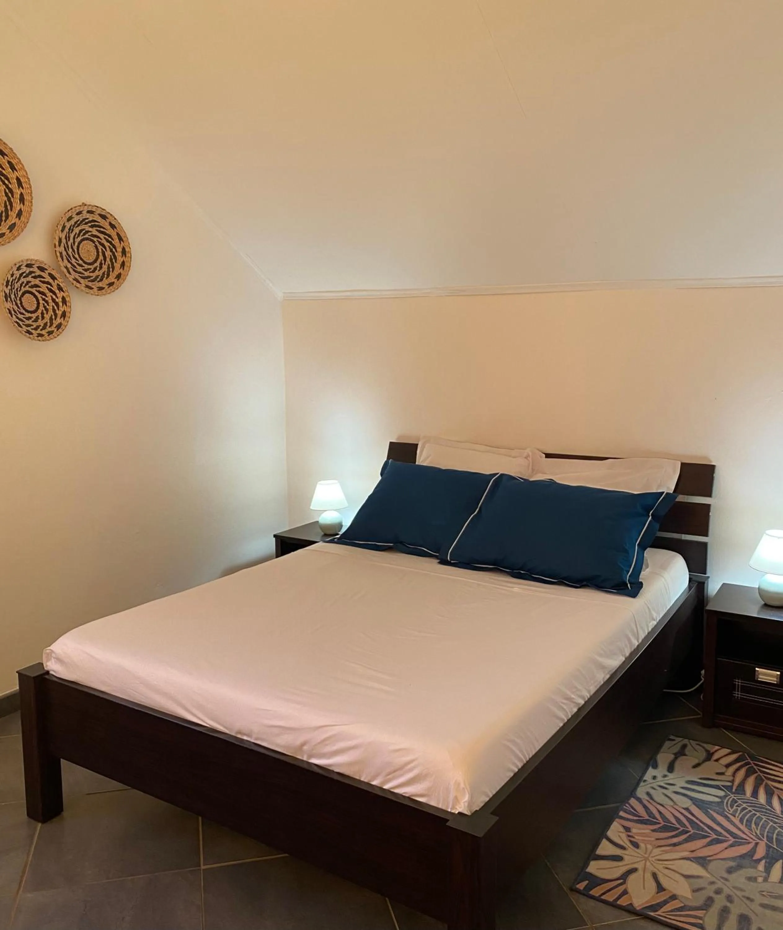 Bed in Ferme l'Eau de Coco