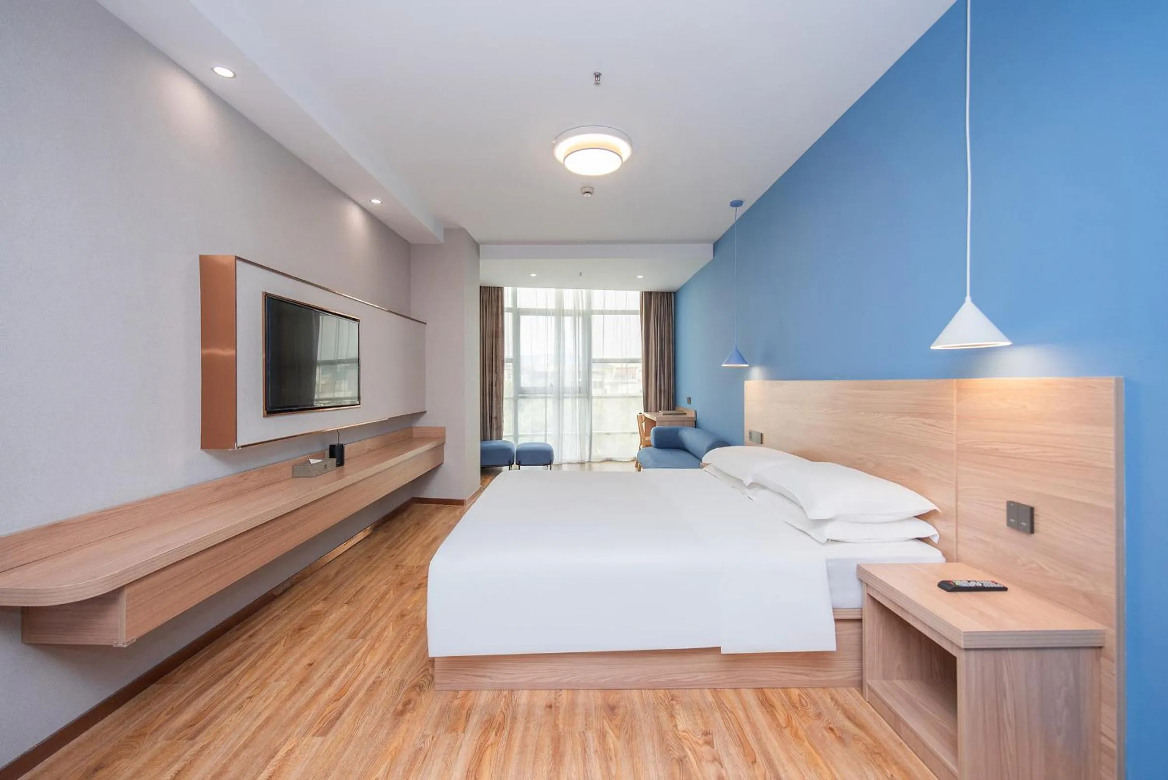 Bed in Future Shangju Hotel