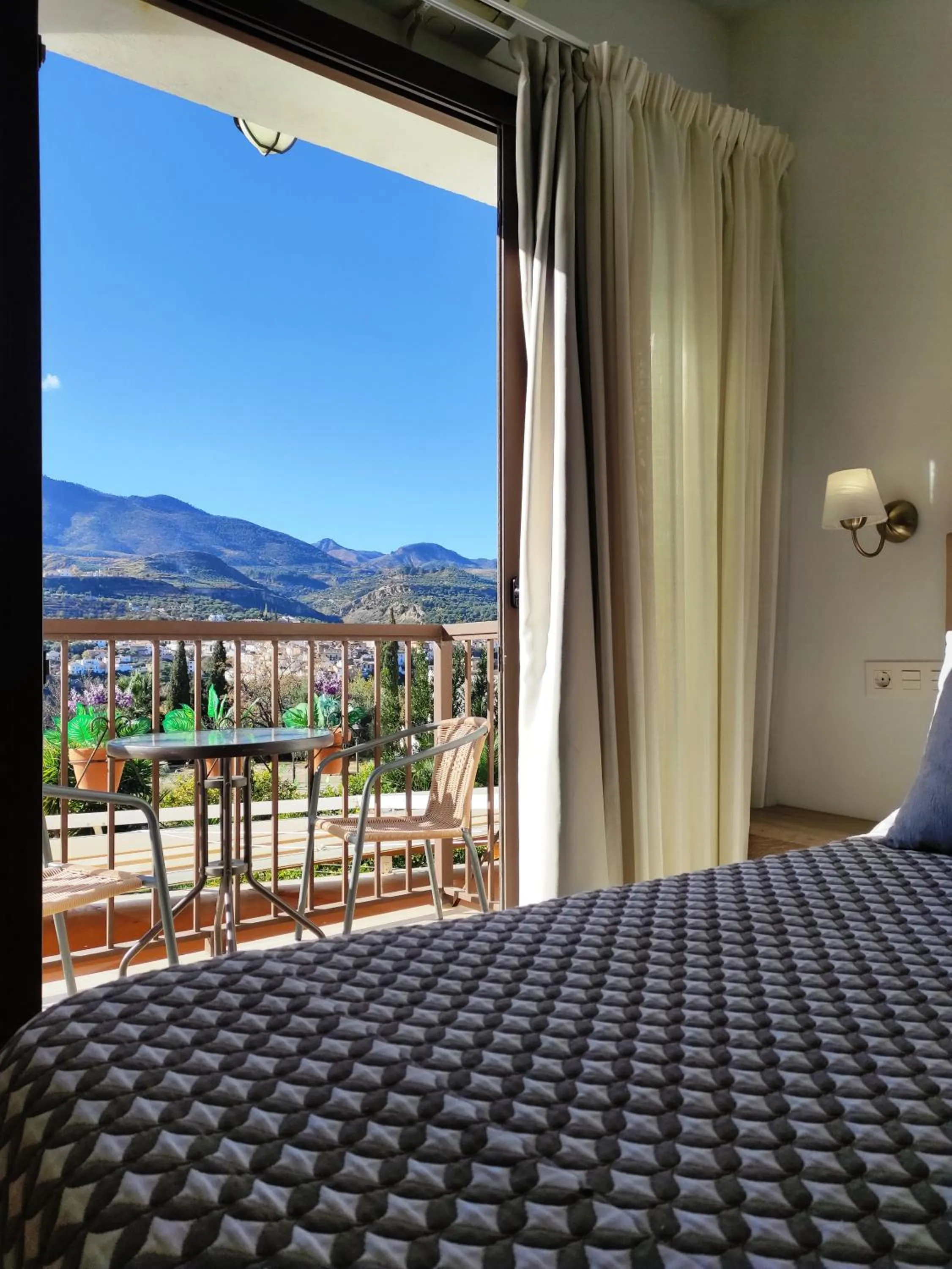 Bed in Hostal y Apartamento Rural Los Naranjos