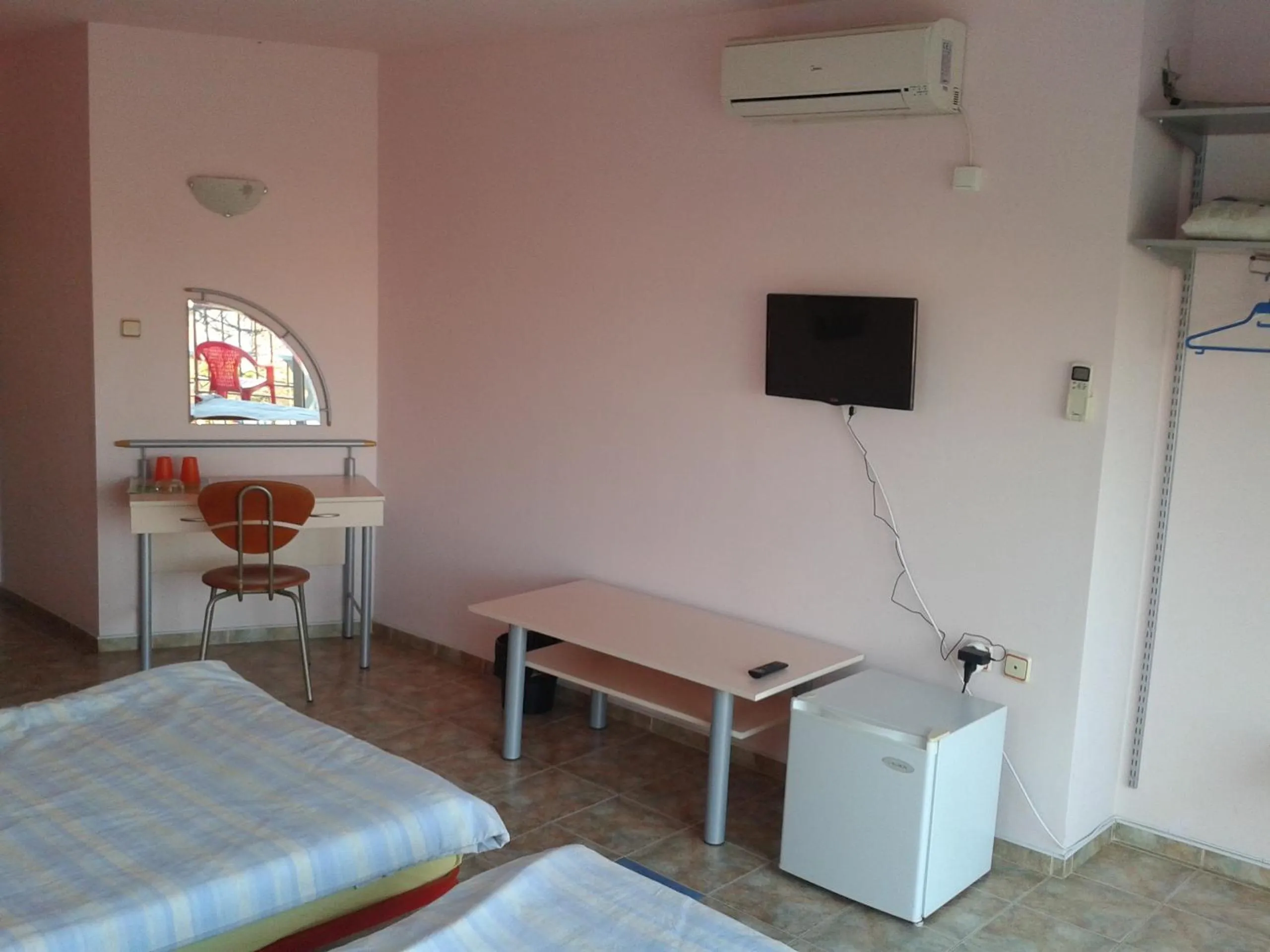 Bed in The Colourful Mansion Hotel