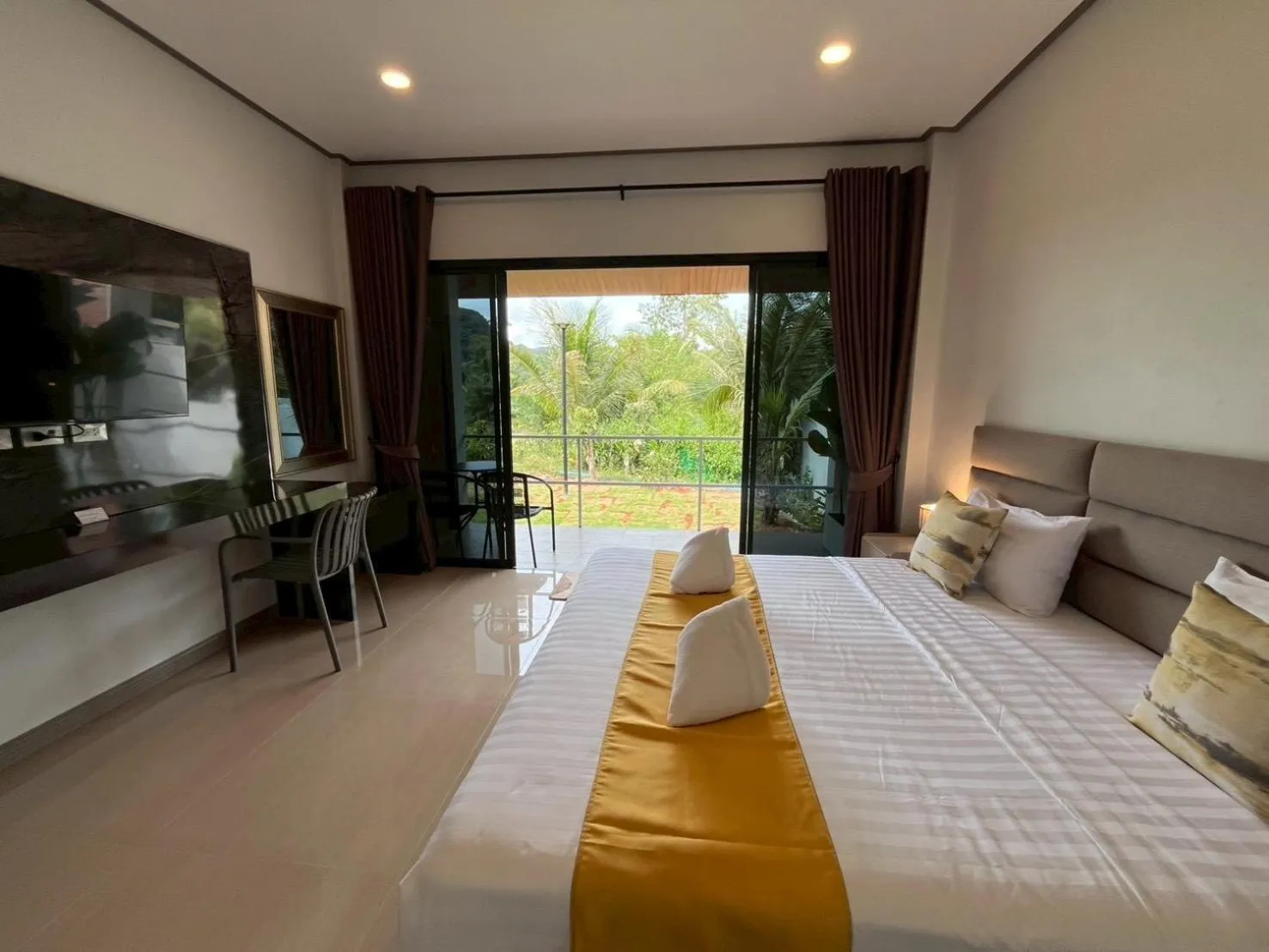 Photo of the whole room, Bed in Marigold Aonang Resort