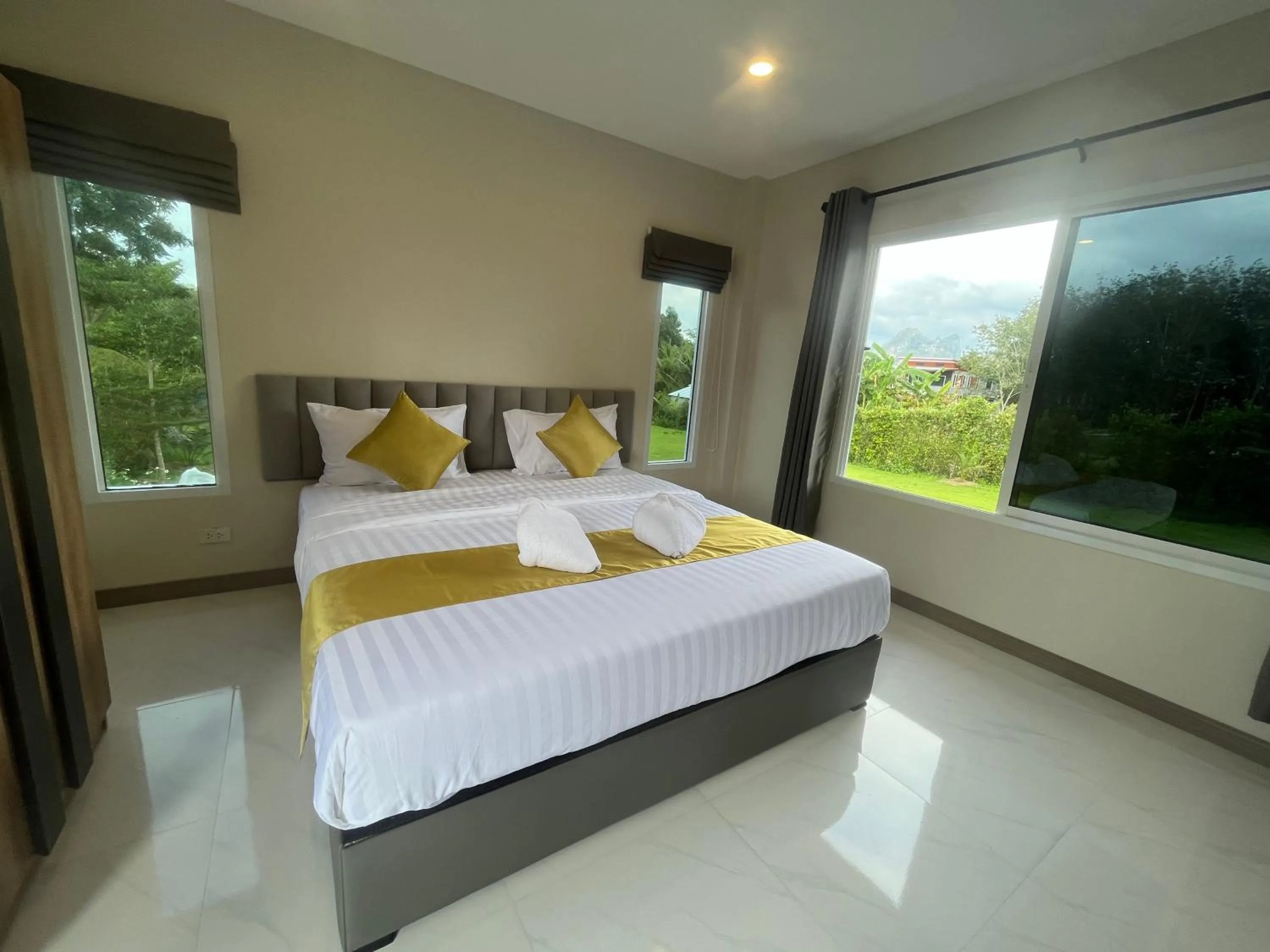 Photo of the whole room, Bed in Marigold Aonang Resort