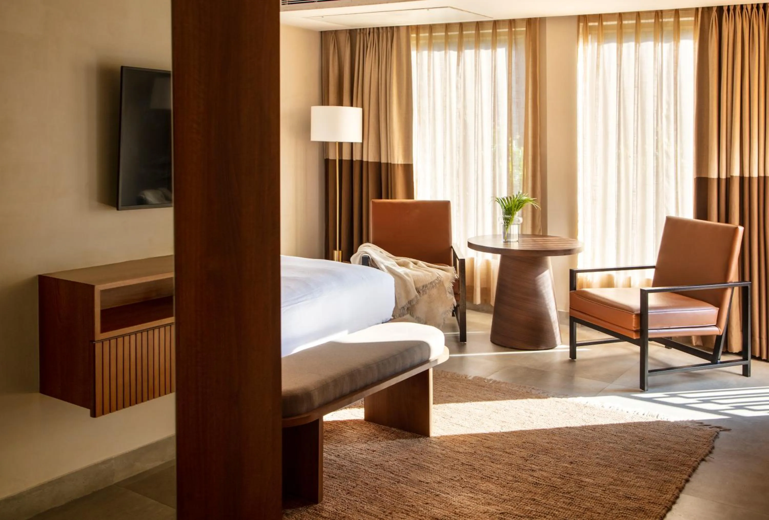 Seating area, Bed in The Greenwood Resort, Guwahati