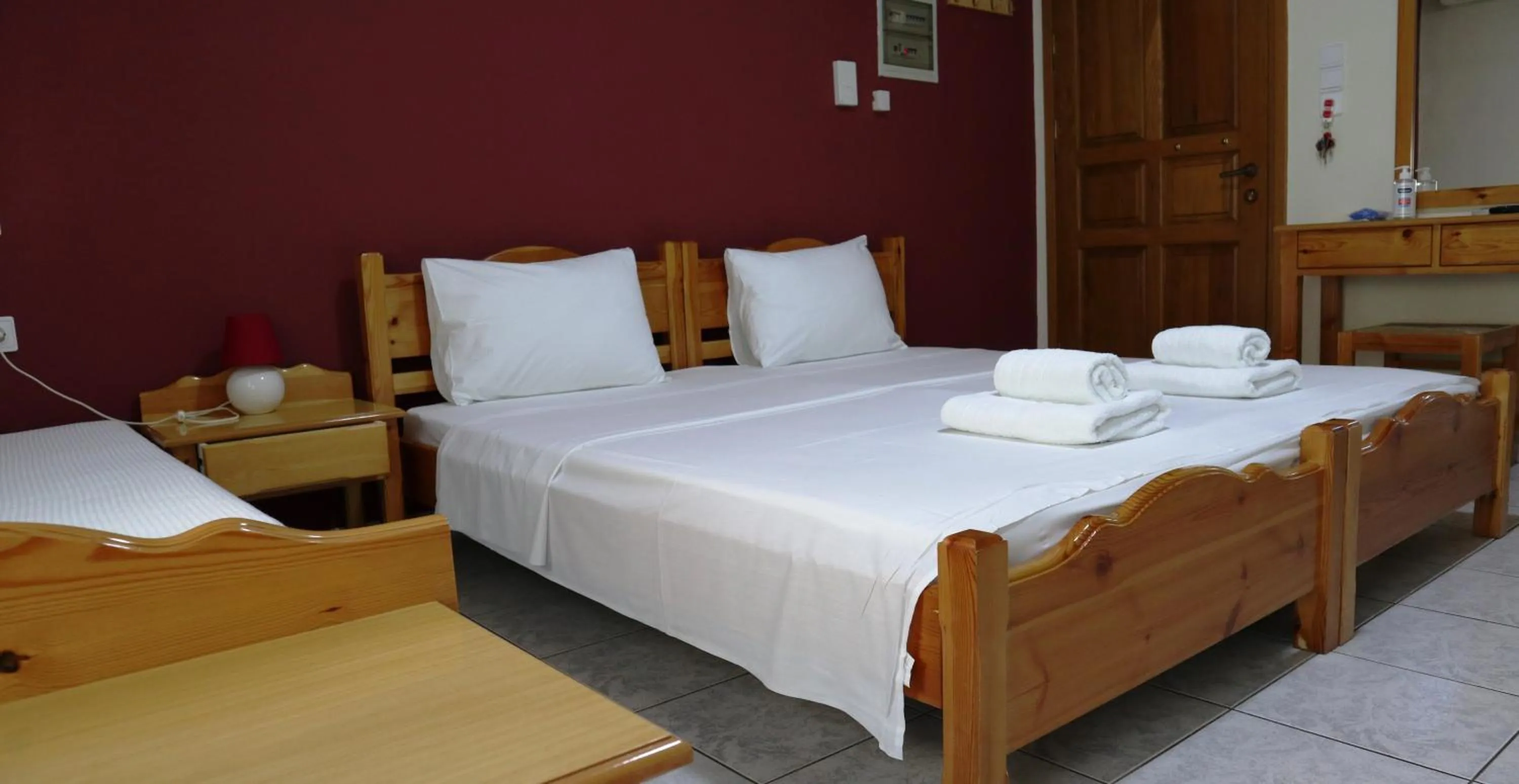 Bed in Delphin Rooms Sivota