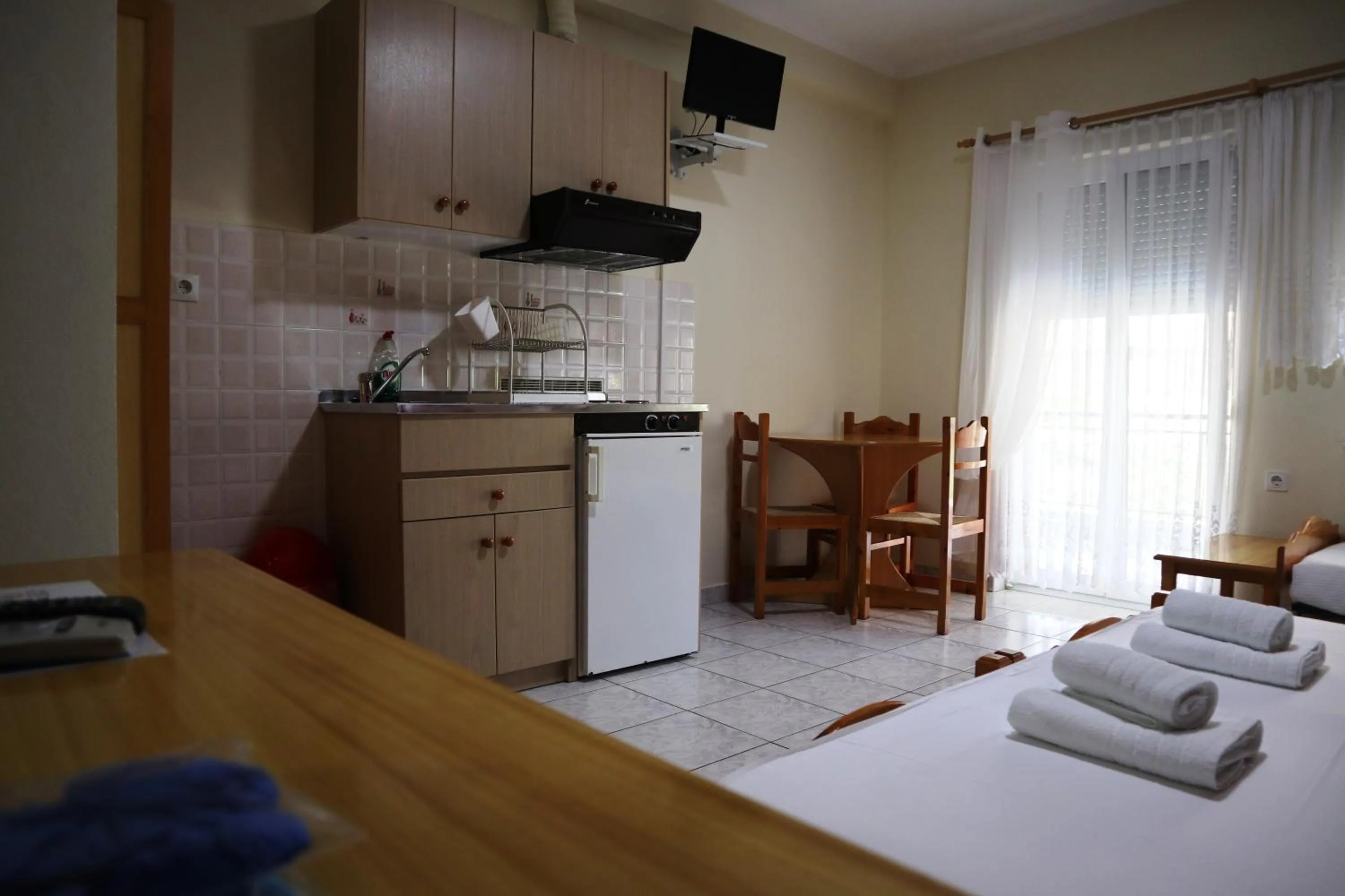 Bed in Delphin Rooms Sivota