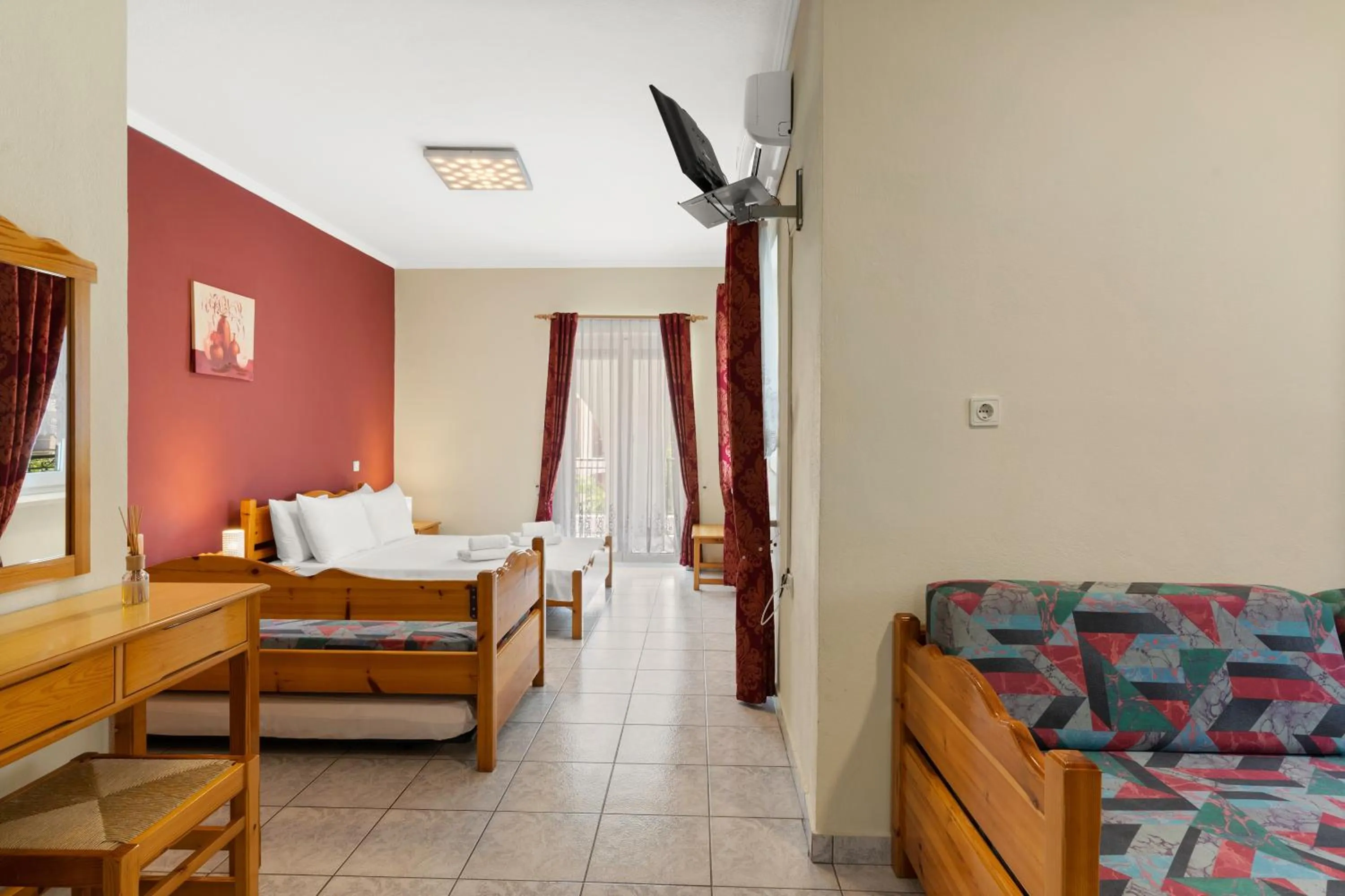 Bed in Delphin Rooms Sivota