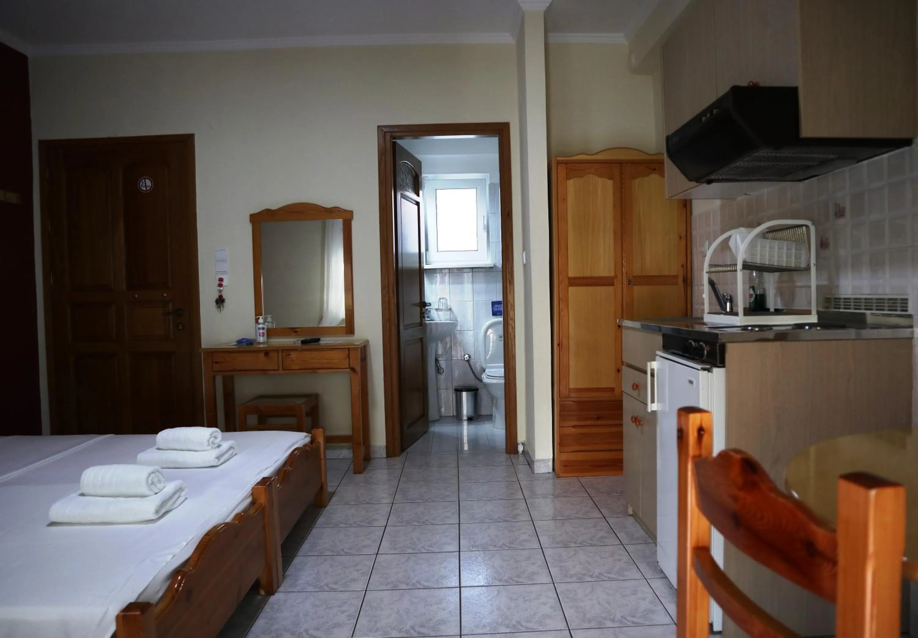 Bed in Delphin Rooms Sivota