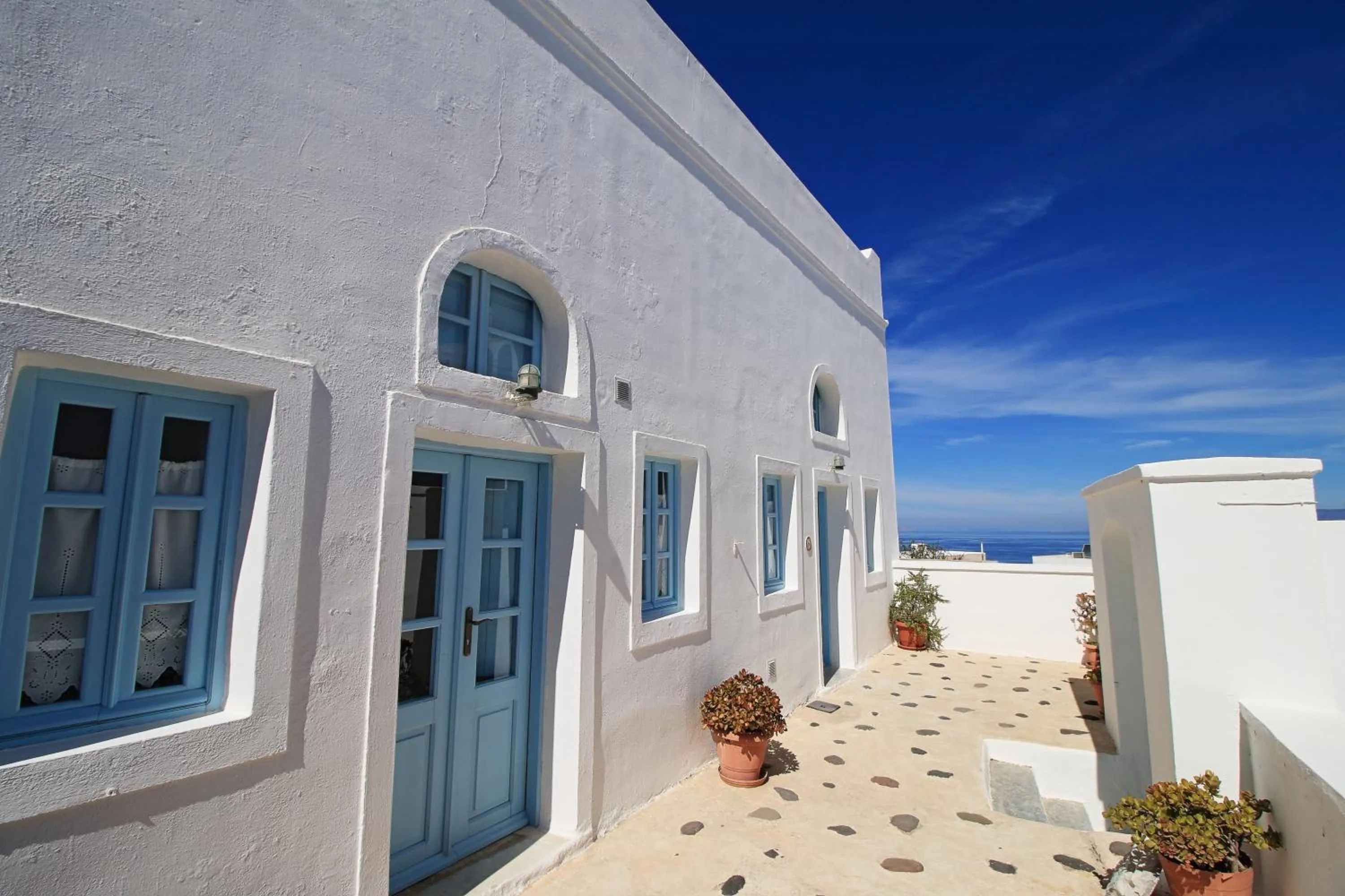 Facade/entrance in Aethrio Sunset Village - Oia