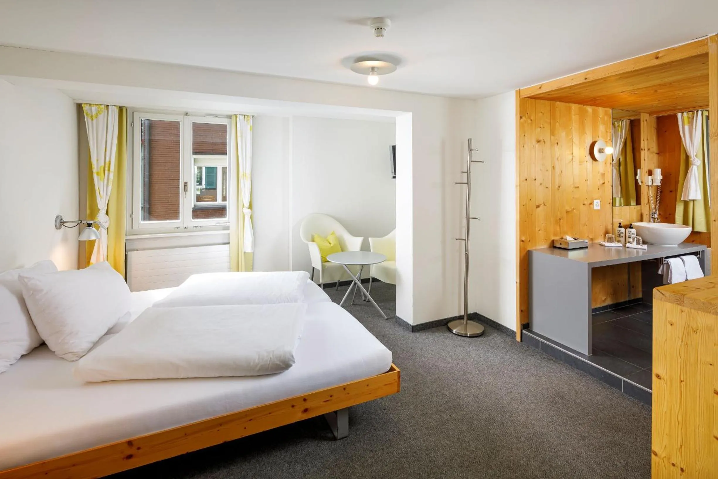 Photo of the whole room, Bed in Hirschen Guesthouse - Village Hotel