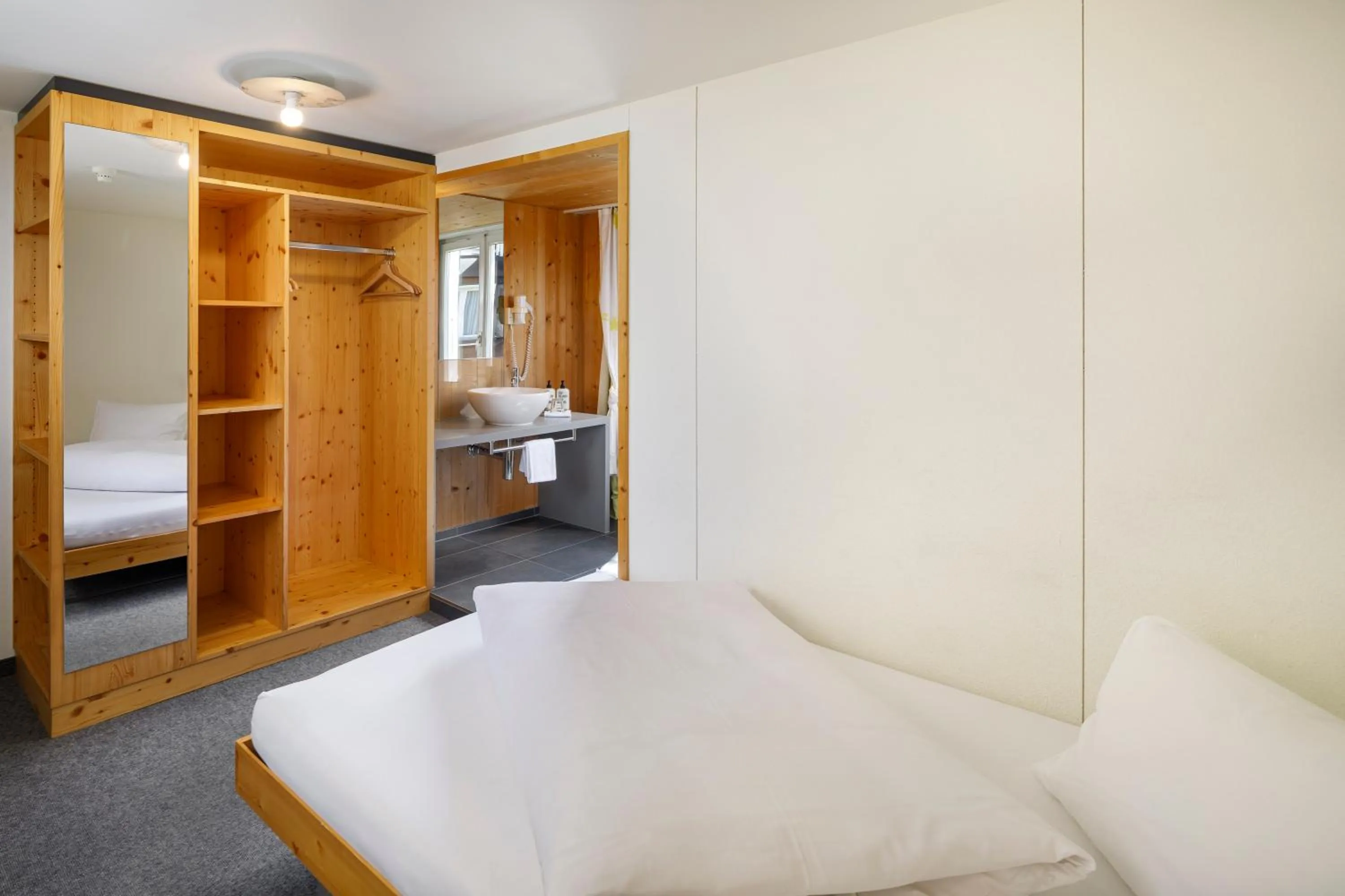 Photo of the whole room, Bed in Hirschen Guesthouse - Village Hotel