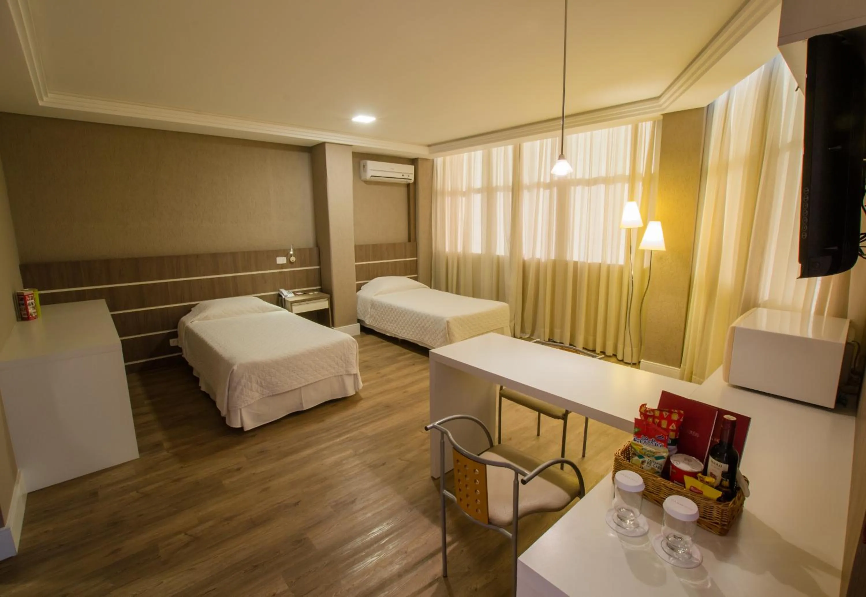 Bed in SJ Royal - San Juan Curitiba