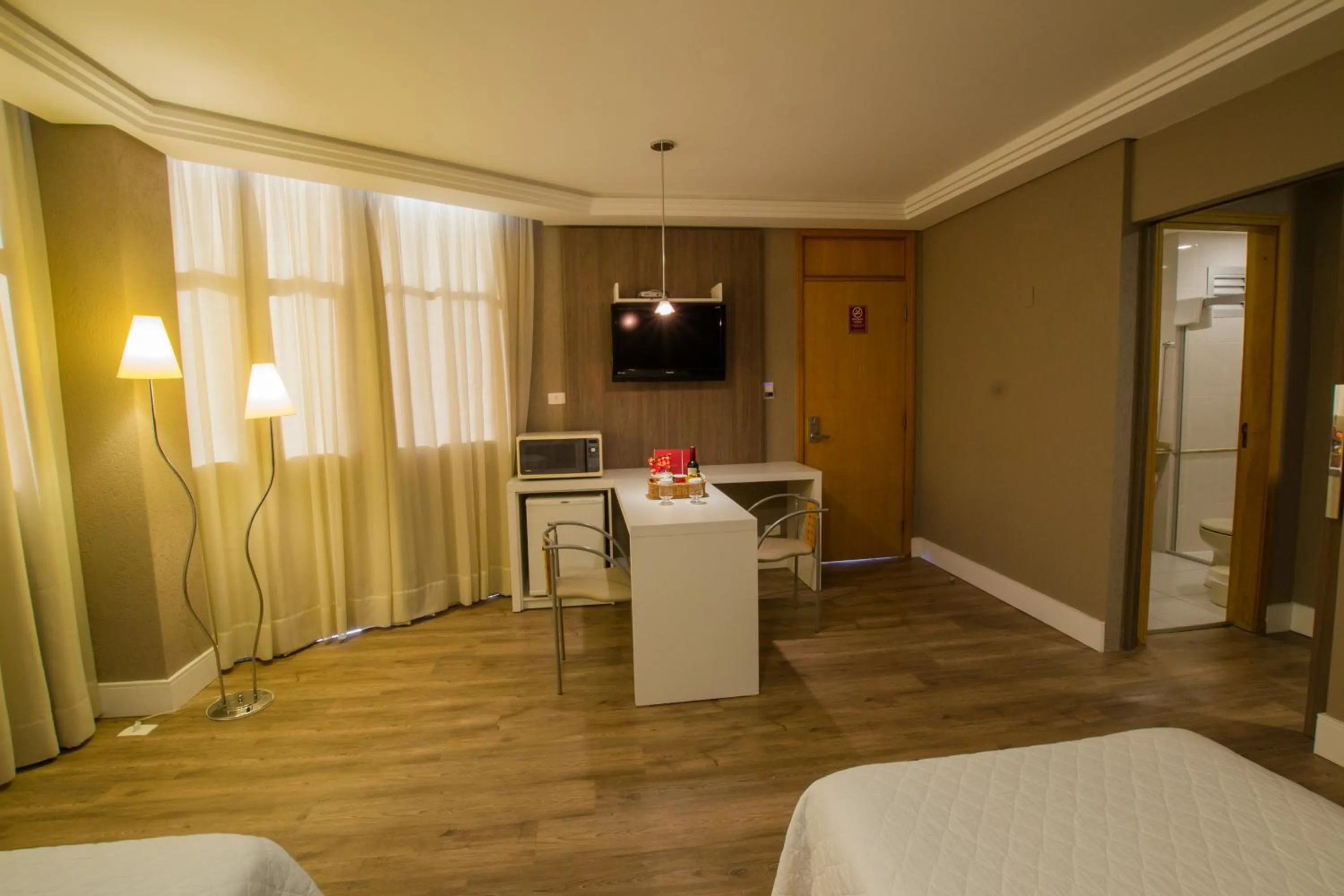 Bed in SJ Royal - San Juan Curitiba