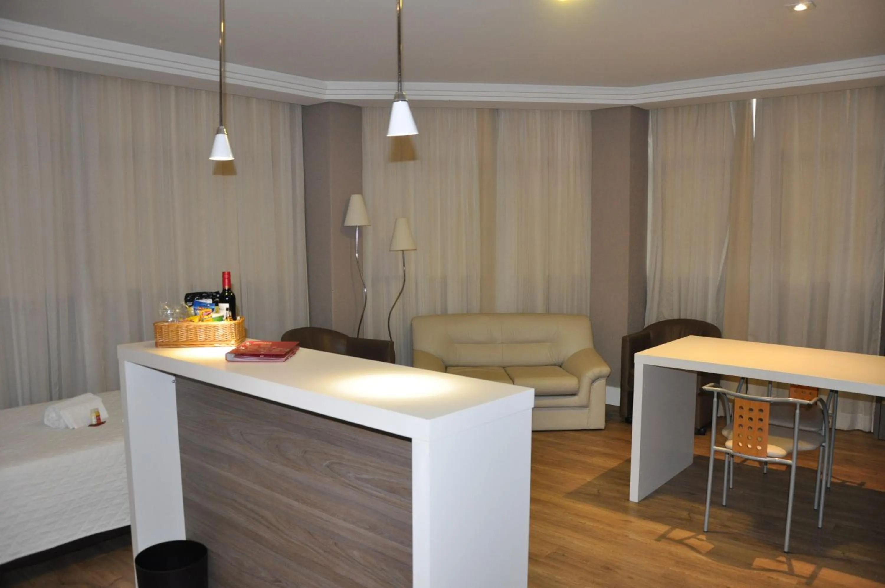 Living room in SJ Royal - San Juan Curitiba