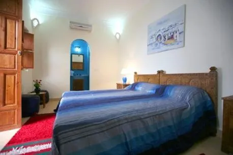 Photo of the whole room, Bed in Riad Morgane