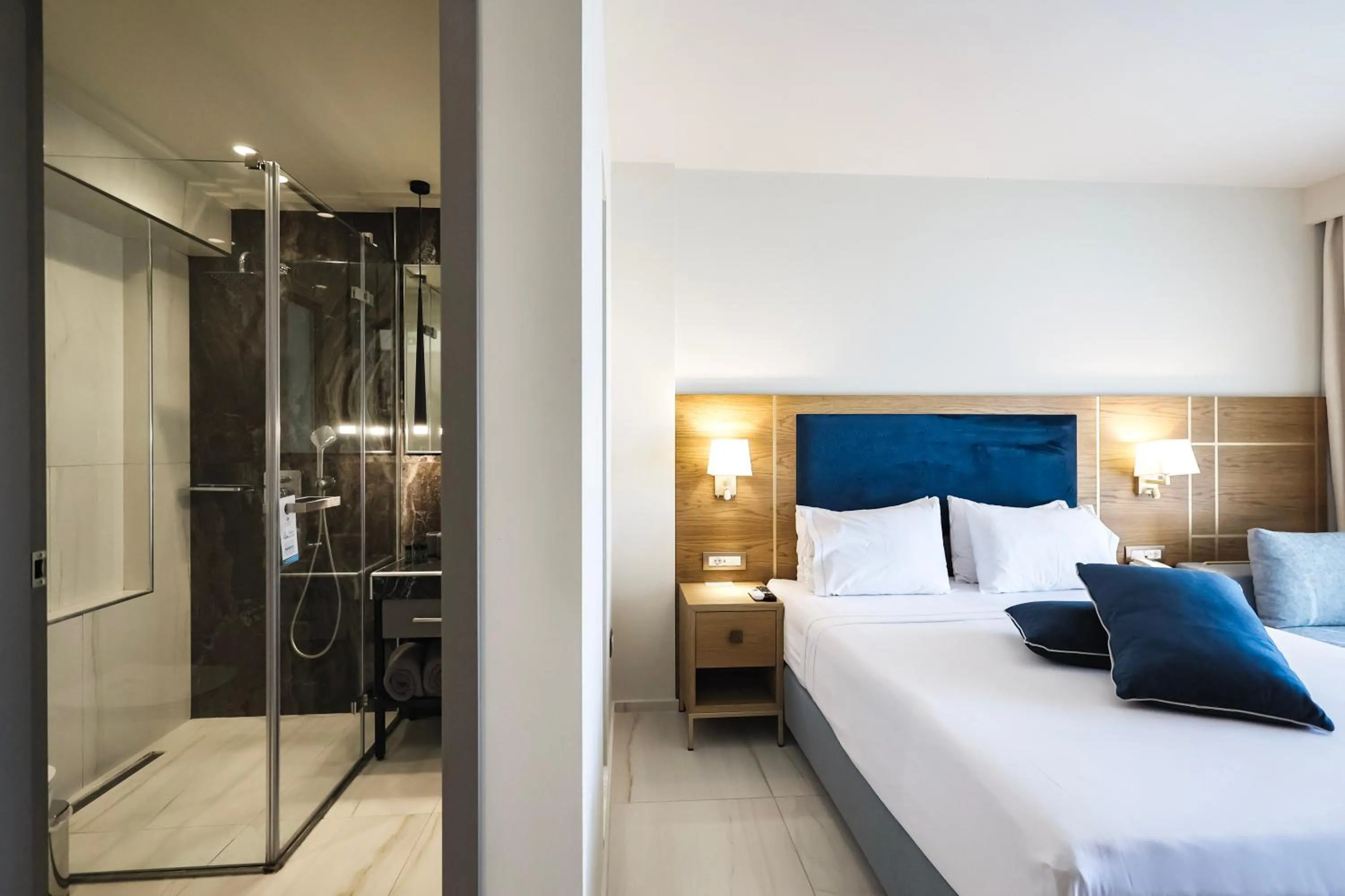 Bathroom, Bed in Serenity Suites