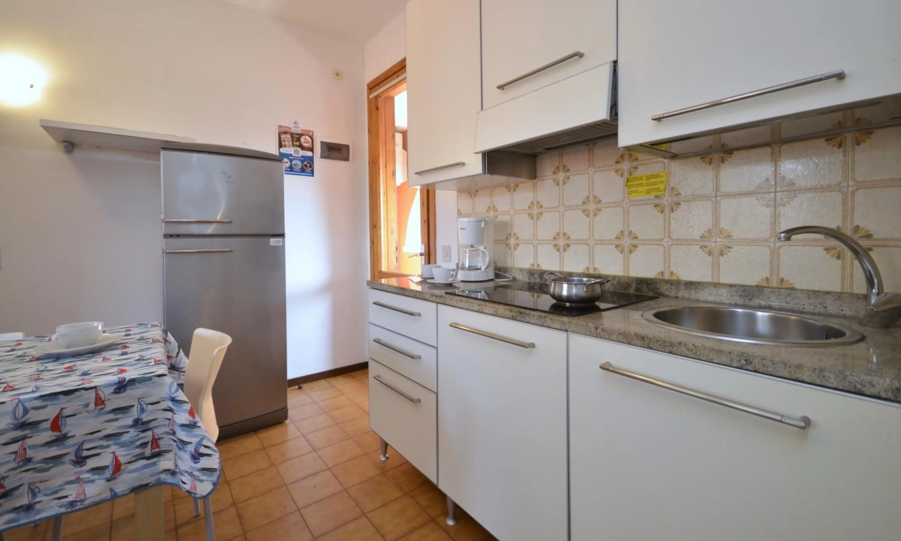 Kitchen or kitchenette in Villaggio Capistrano