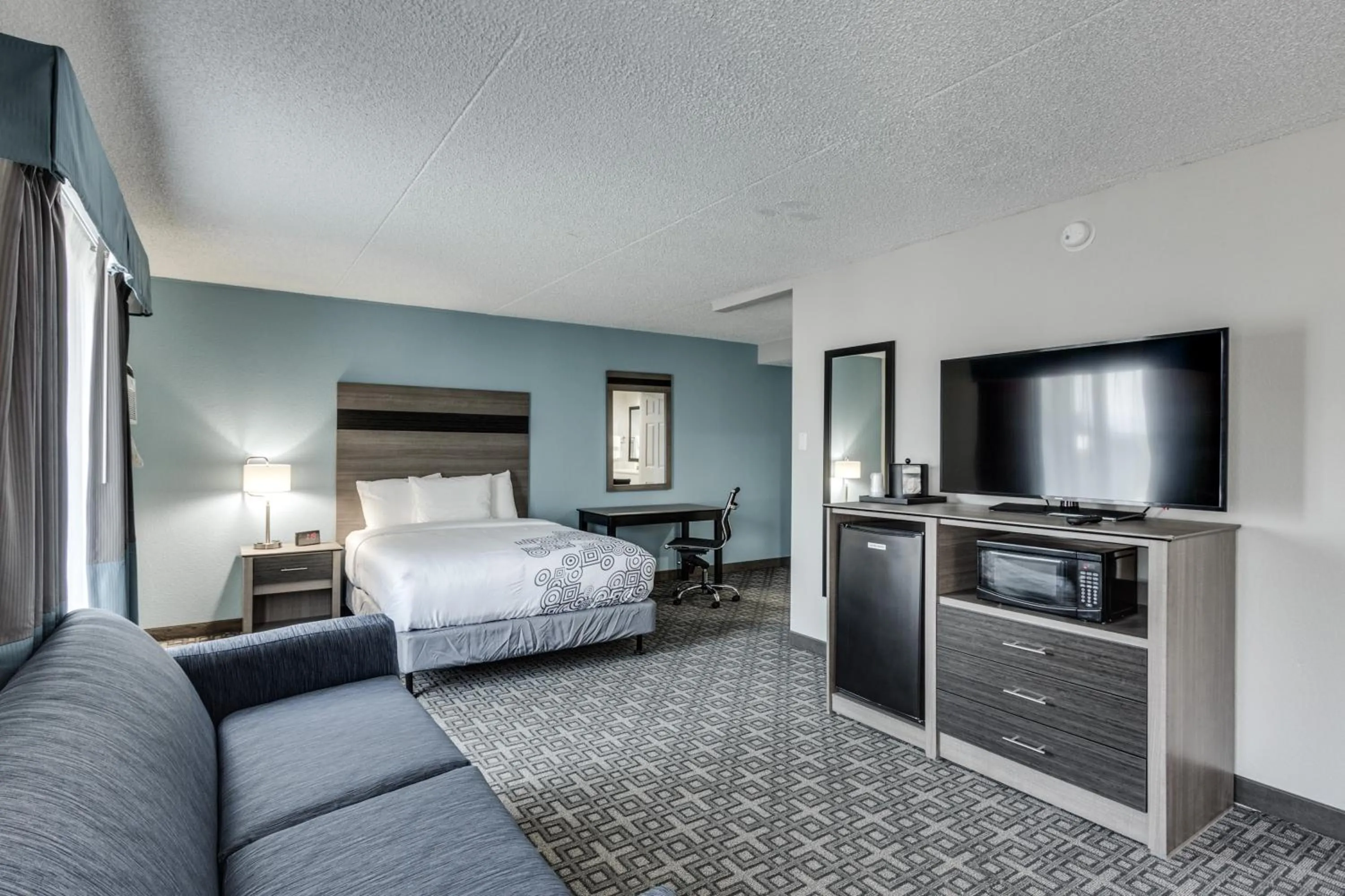 Bed in Days Inn & Suites by Wyndham Spokane