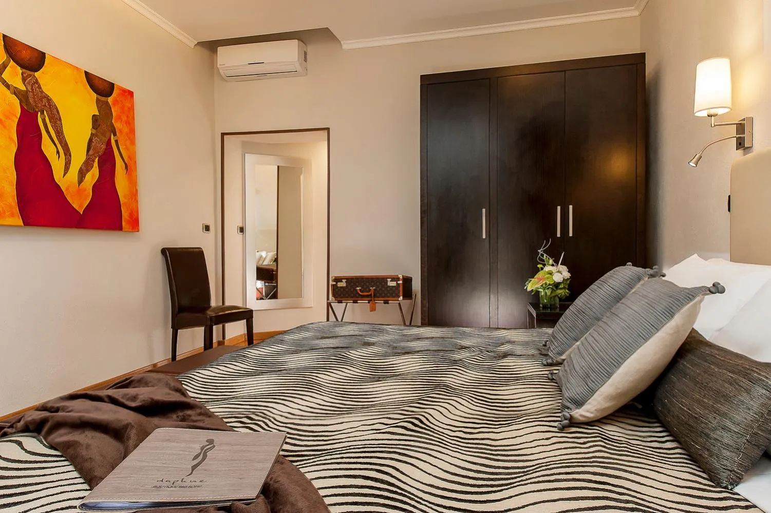 Bed in Daphne Suites