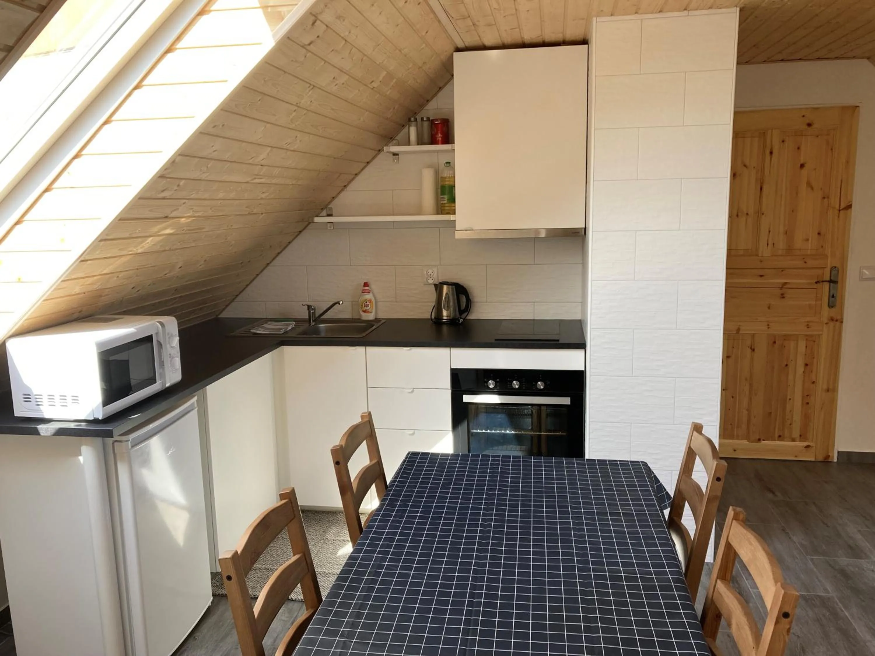 Kitchen or kitchenette in Pension Pošta