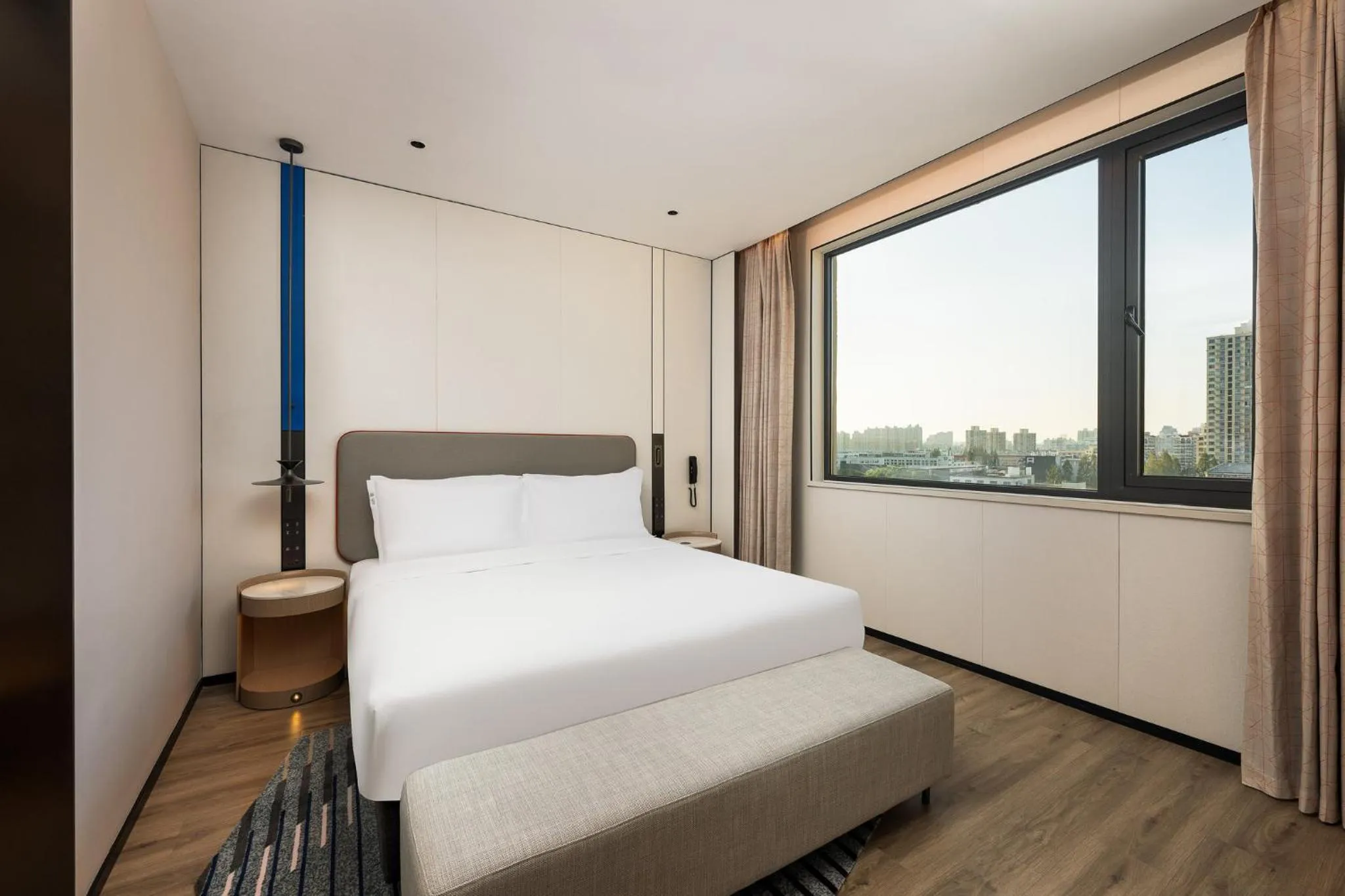 Photo of the whole room, Bed in Holiday Inn Express Shanghai Changyang Road by IHG