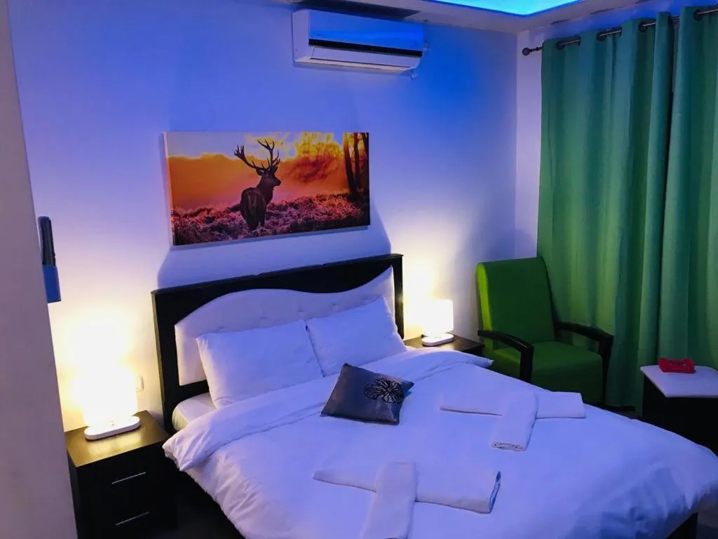 Bed in Assaraya Palace Hotel