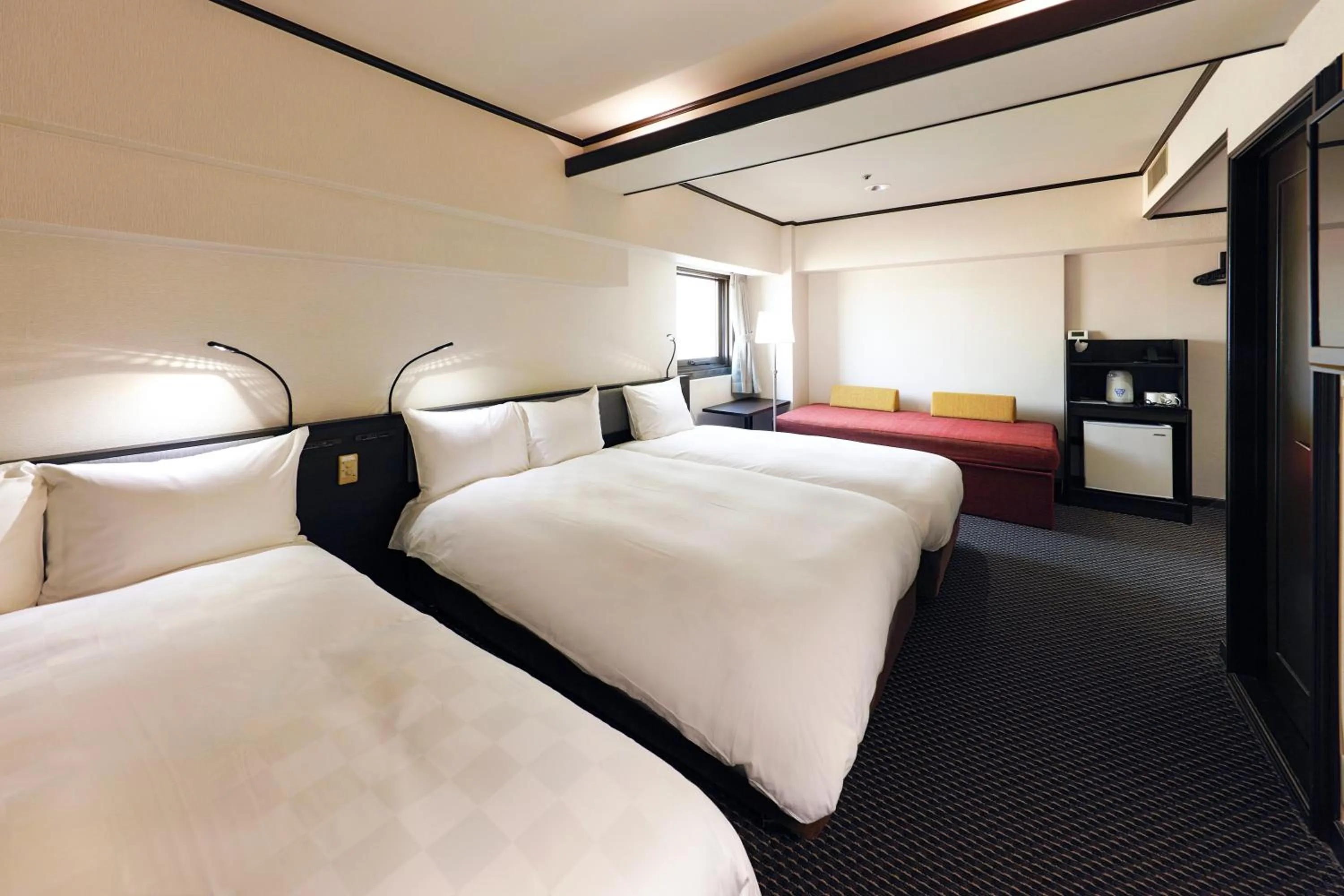 Bed in Hotel Consort Shin-Osaka