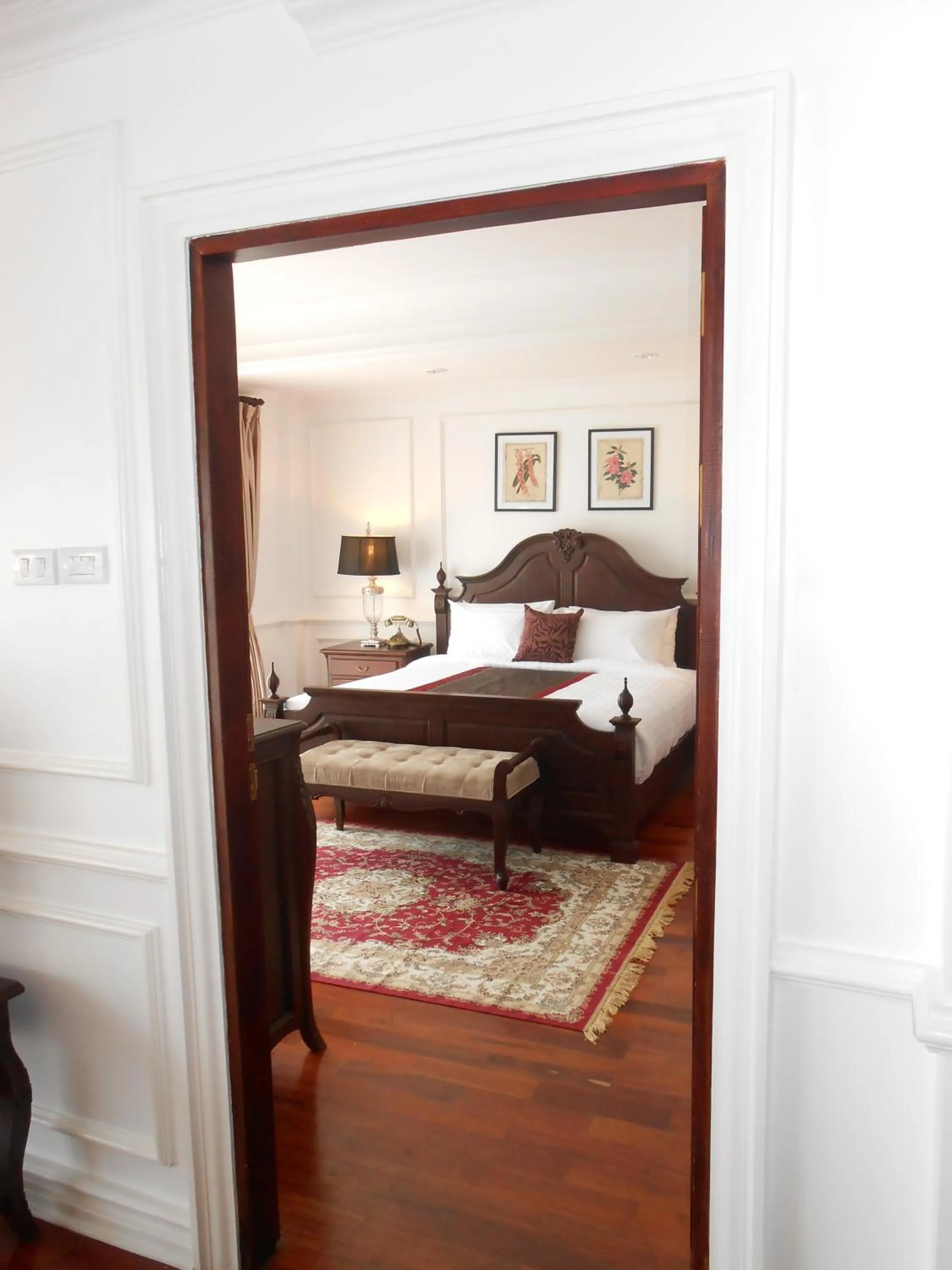 Bed in Dhavara Boutique Hotel