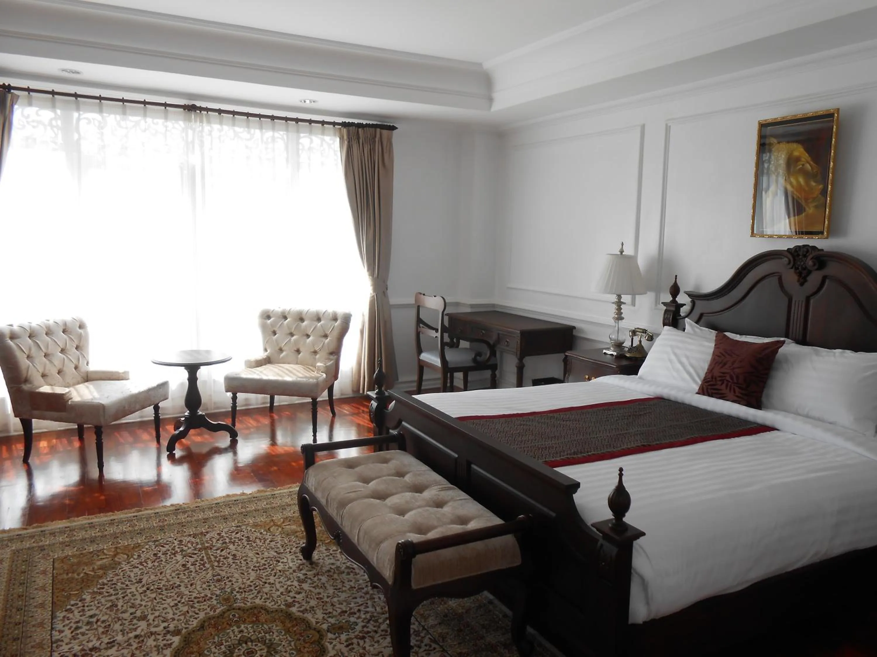 Bed in Dhavara Boutique Hotel