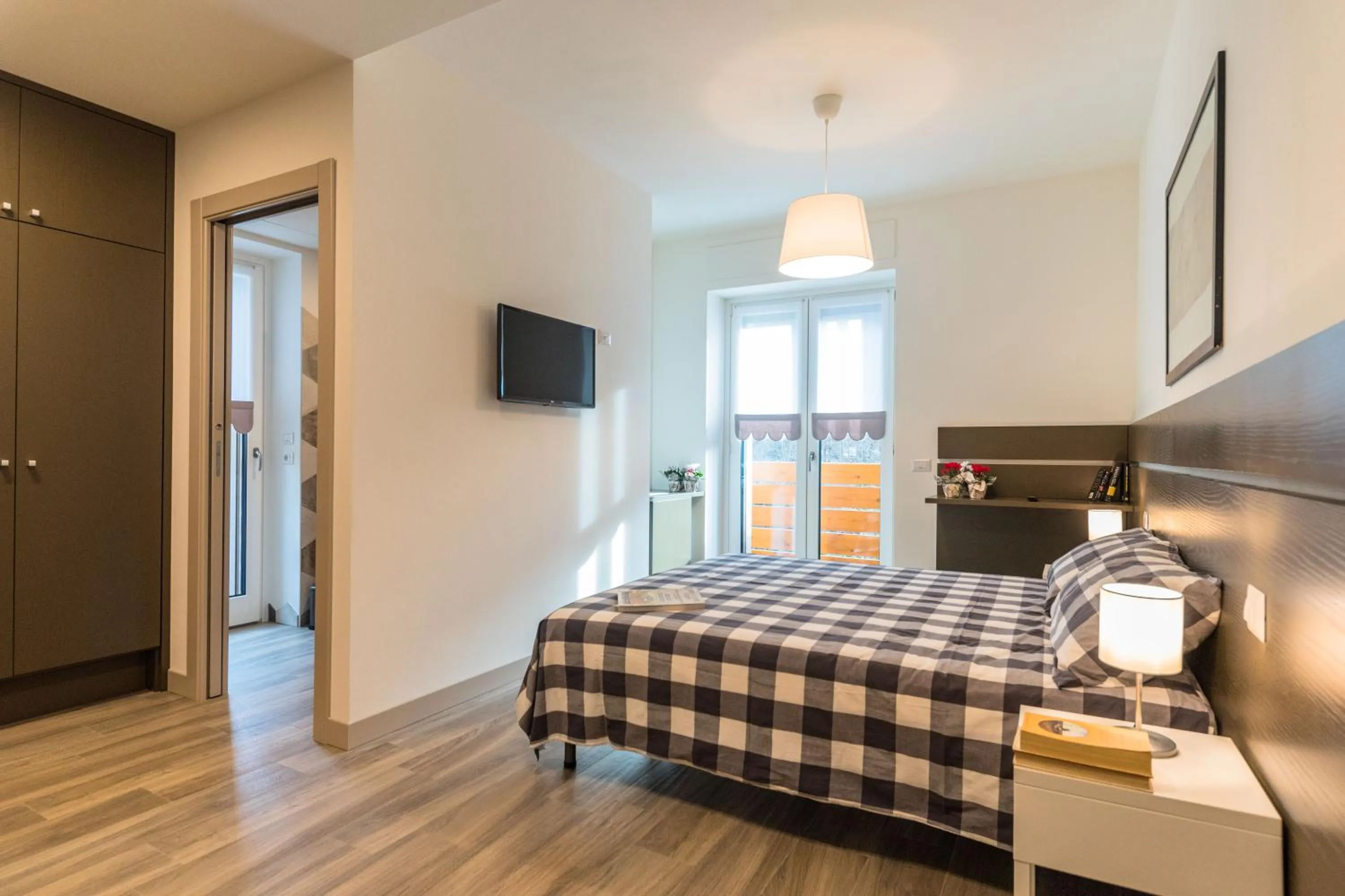 Bed in parina Inn – Locanda