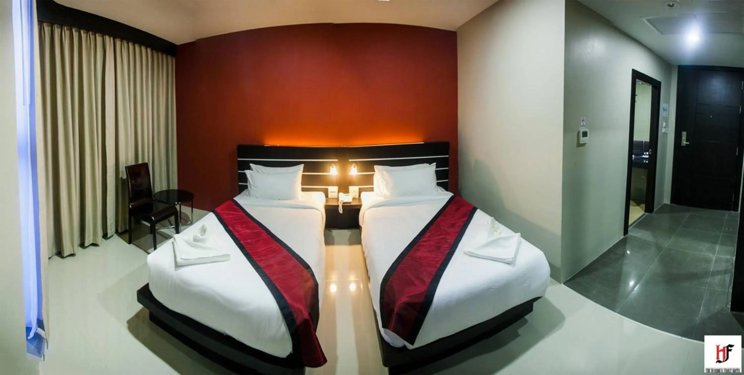 Photo of the whole room, Bed in The Harbour Front Hotel