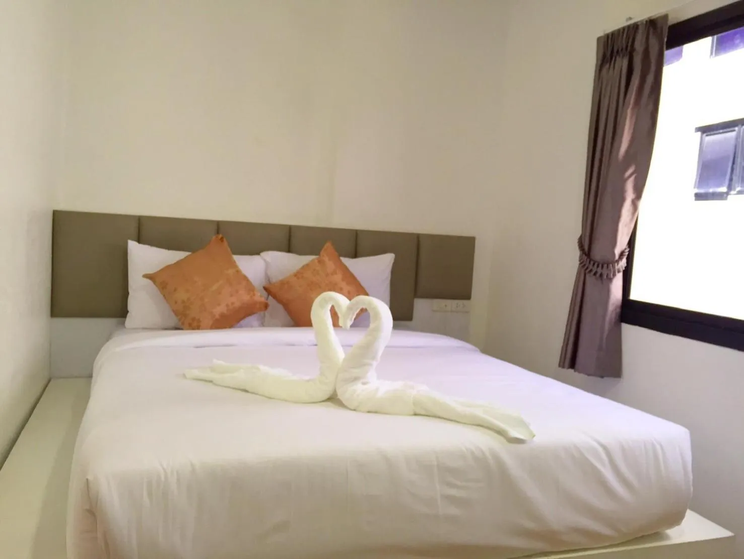 Bed in The Harbour Front Hotel