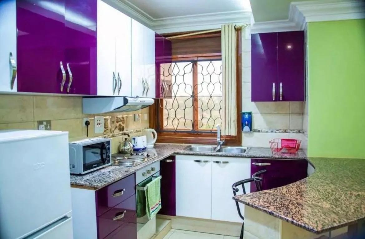 Kitchen or kitchenette in Dina Apartments