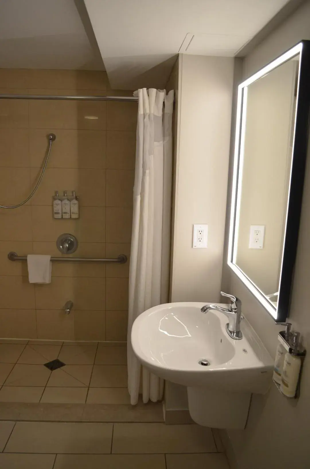 Standard King Room with Mobility Accessible Roll-In Shower in Holiday Inn & Suites Montreal Airport by IHG Standard King Room with Mobility Accessible Roll-In Shower in Holiday Inn & Suites Montreal Airport by IHG