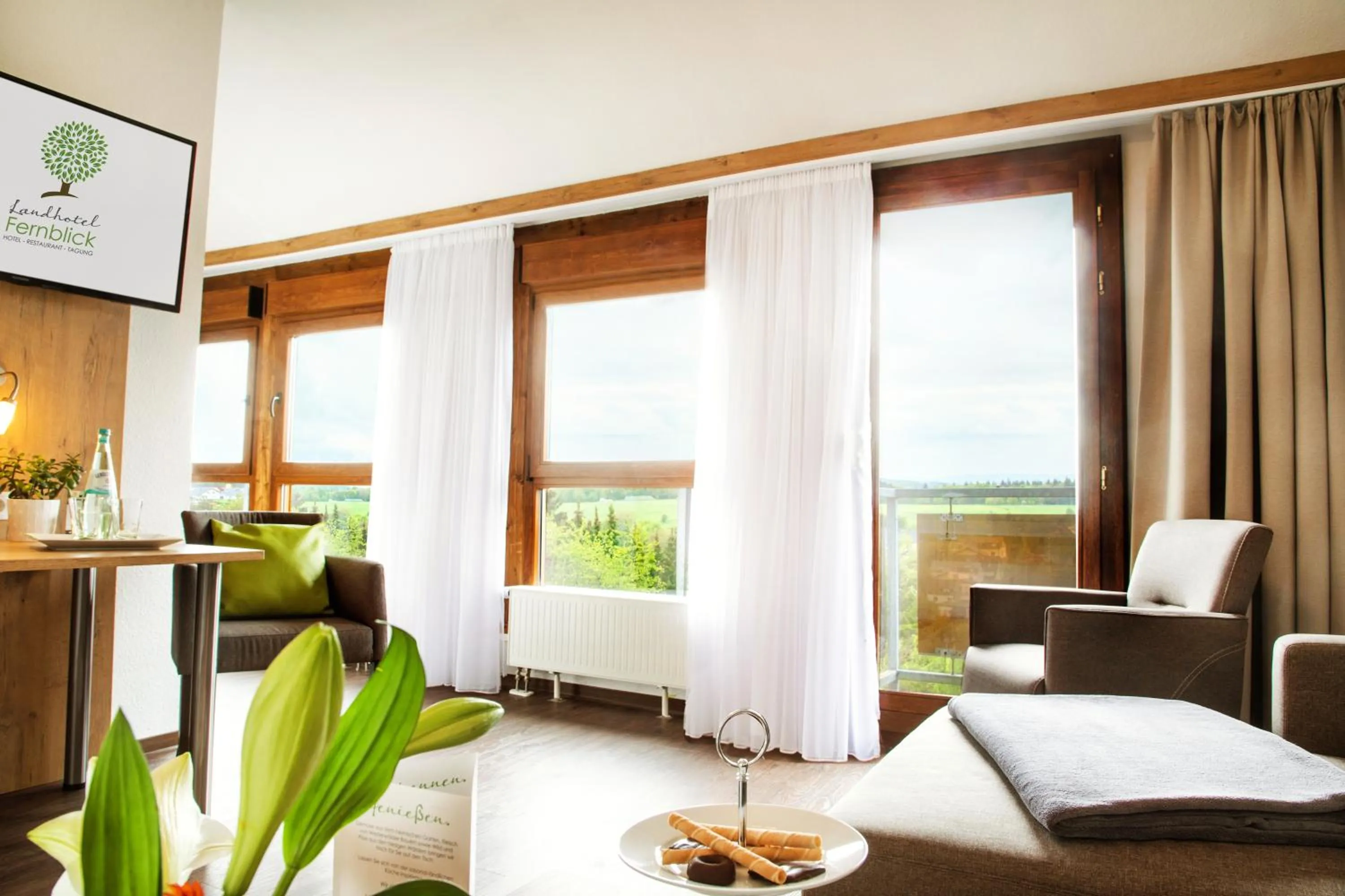 Living room, Bed in Landhotel Fernblick