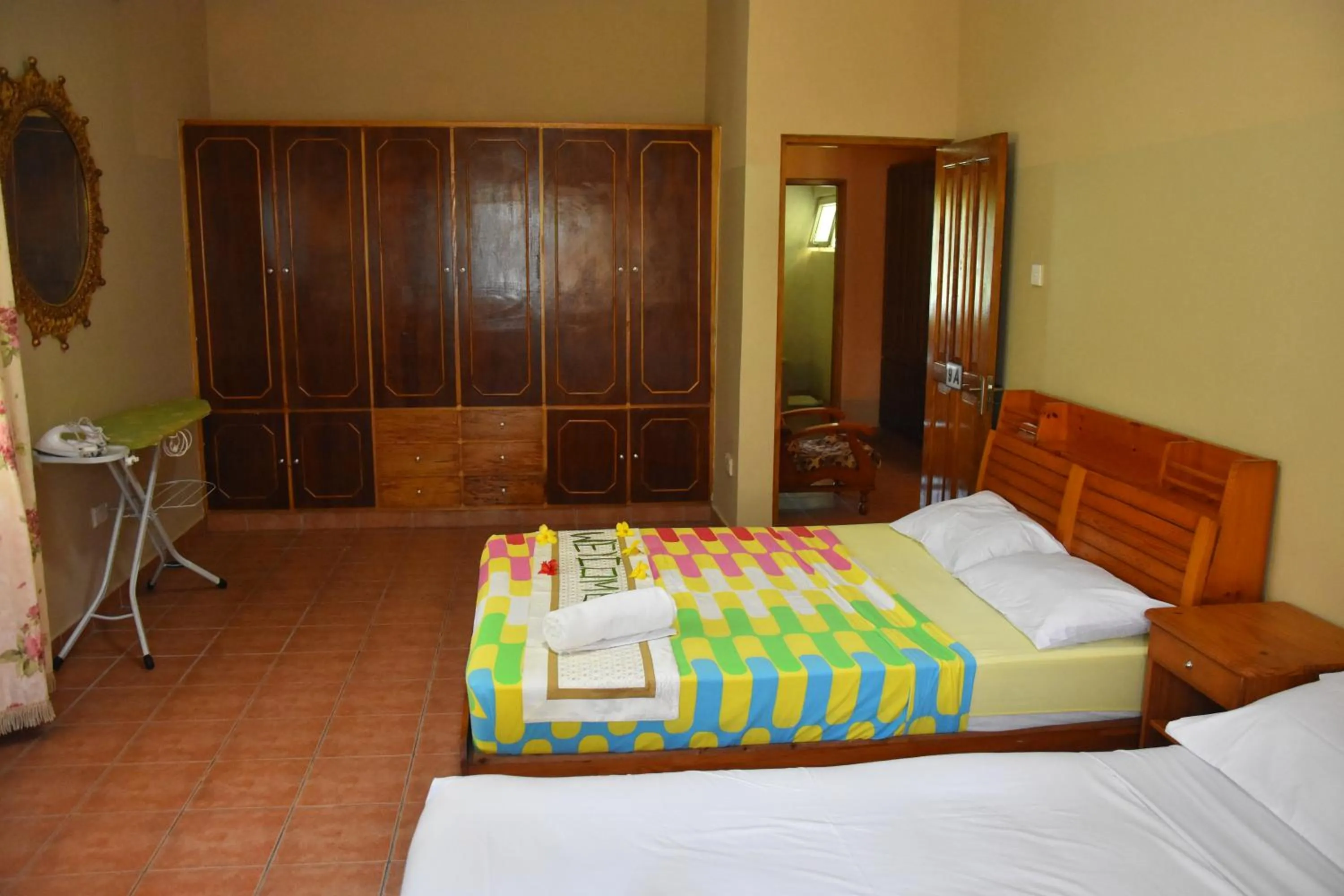 Bed in Reef Holiday Apartments