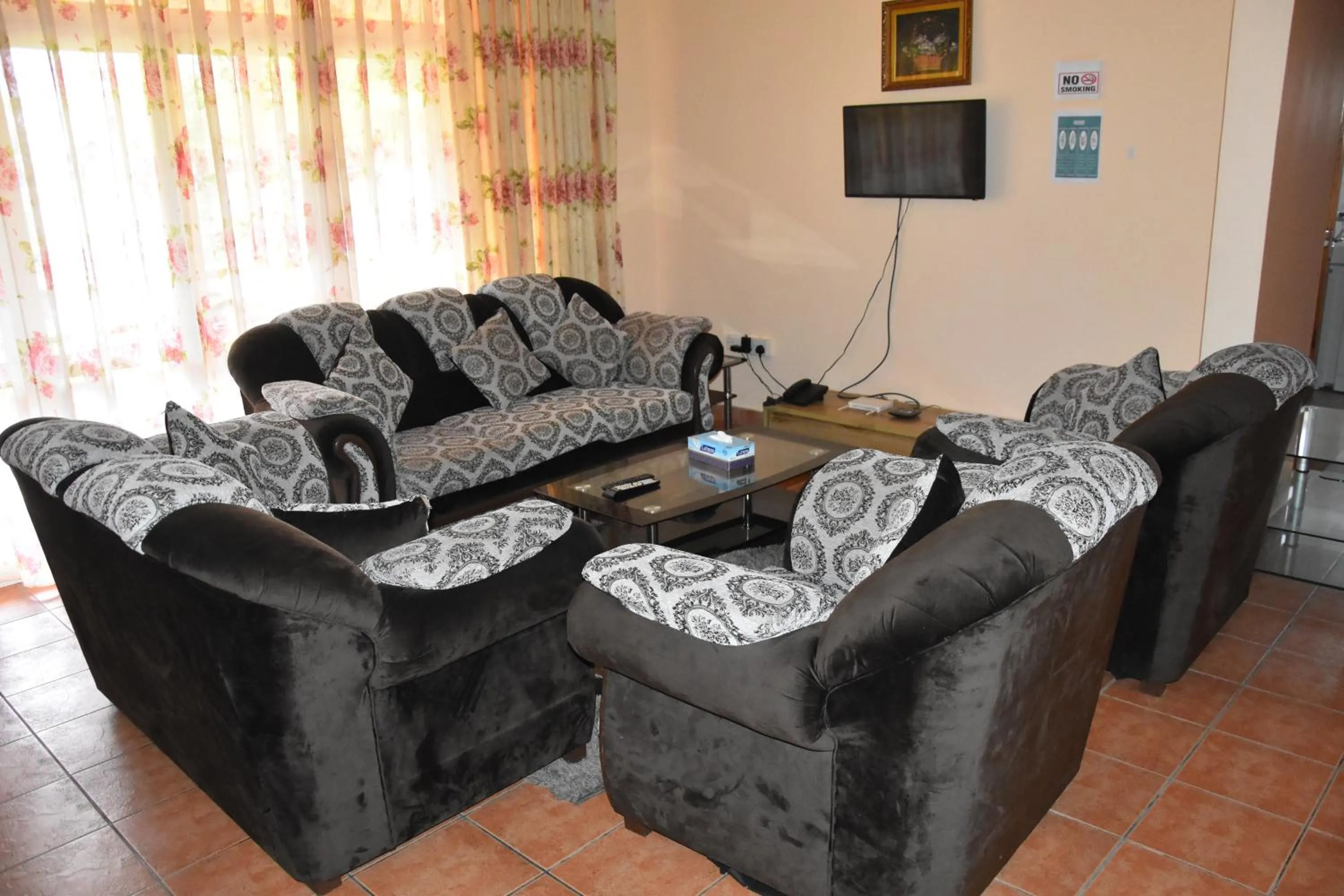 Living room in Reef Holiday Apartments