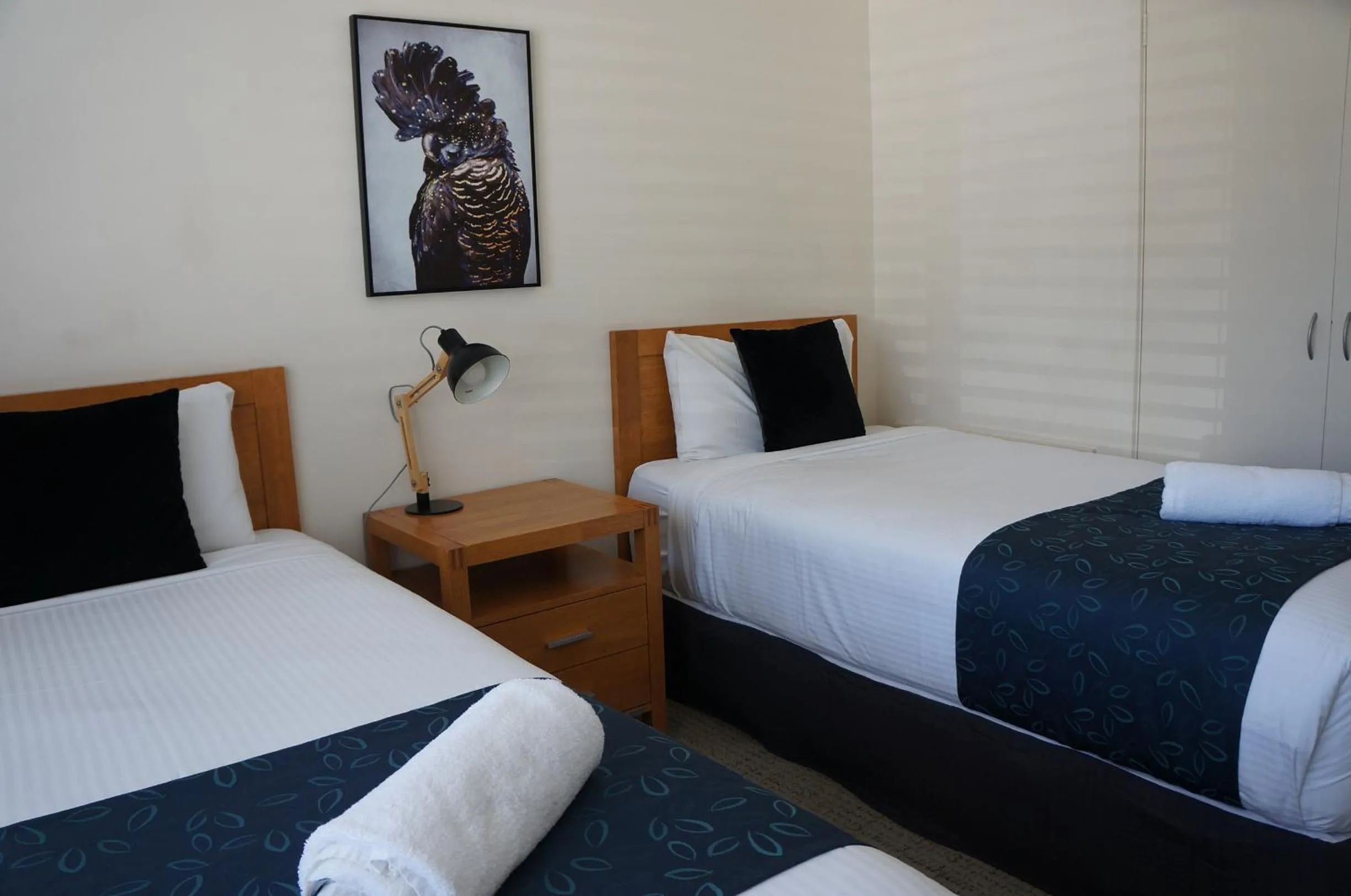 Bed in Waves Motel and Apartments